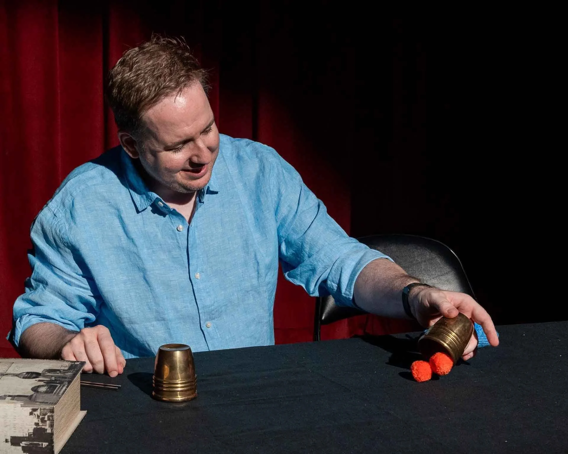 James Alan does the cups and balls at the Toronto Fringe Festival