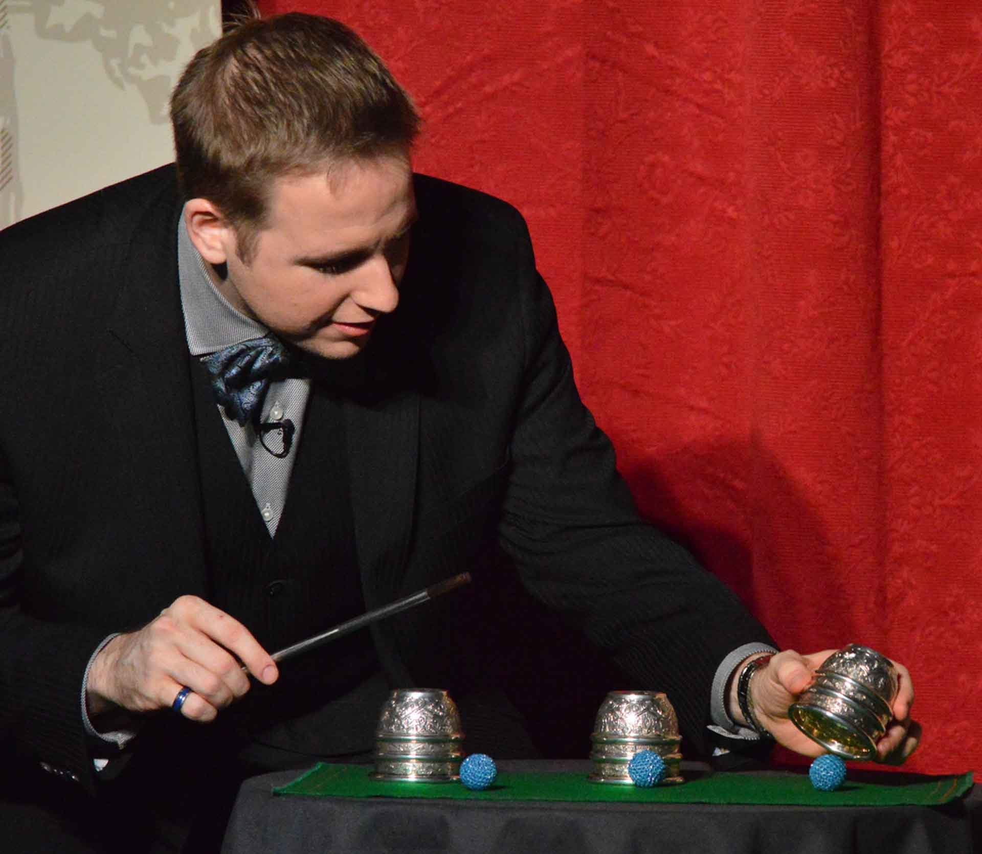 James Alan performing the cups and balls at the Crimson Lounge in Toronto