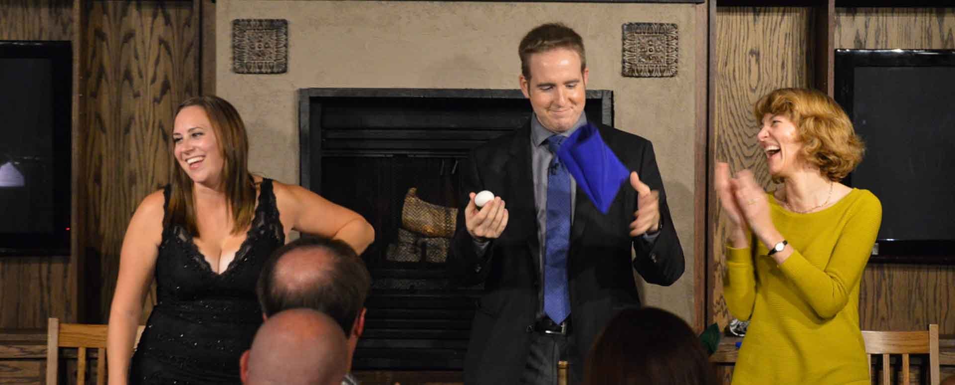 James Alan does magic with an egg during Magic and Martini in Oakville