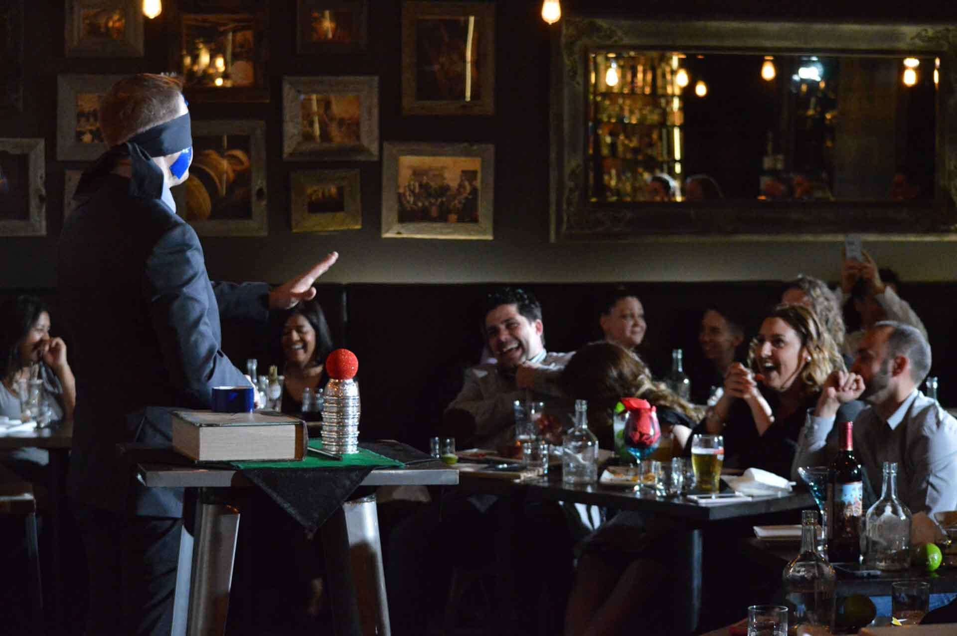Audience applause and laughter at Magic and Martini at Spirit House in Toronto