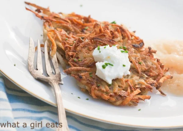 This crispy potato latke recipe from what a girl eats is a healthier version of the traditional favorite adapted from Cooking Light. 