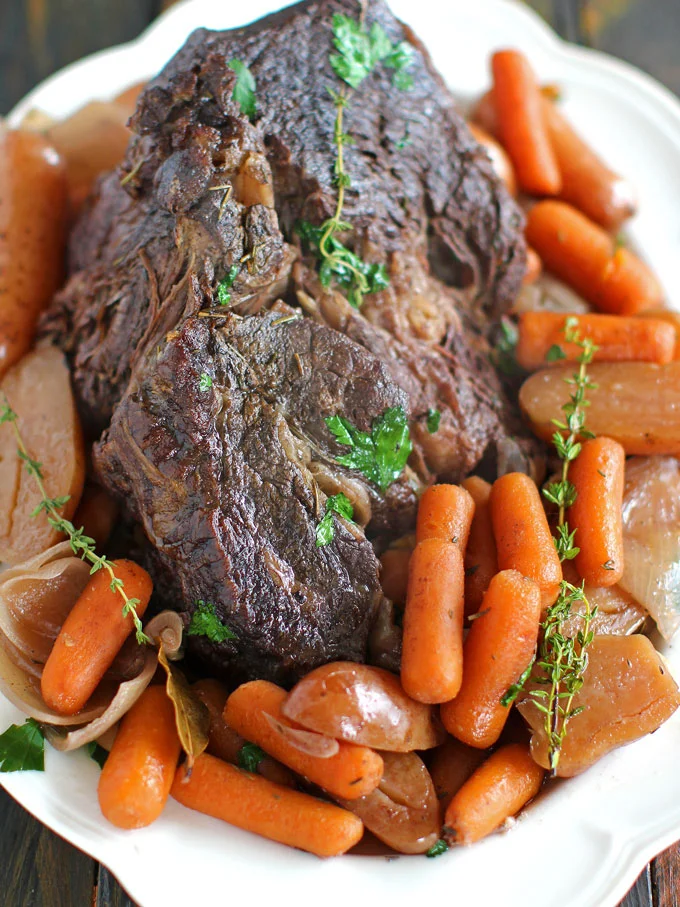 Slow cooker pot roast with red wine from Sweet & Savory Meals .