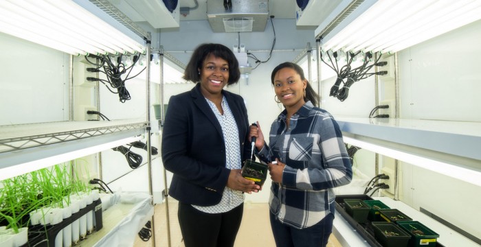 BETSY ROBERTS (LEFT) – ASSISTANT PROFESSOR OF BIOLOGY – WITH STUDENT LAETICIA IBOKI. IBOKI AND A FORMER CLASSMATE WILL PRESENT THEIR RESEARCH ON A NEW ANTIBIOTIC THIS SPRING ON CAPITOL HILL.