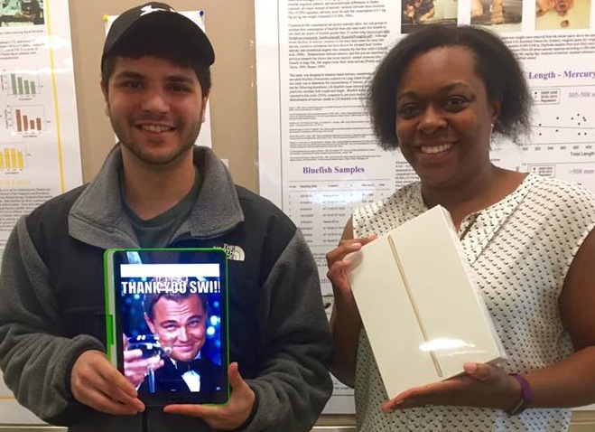 SWI MEME CONTEST WINNER DAN LANDINO WITH HIS PROFESSOR DR. BETSY LEWIS ROBERTS AND THEIR iPAD AWARDS!