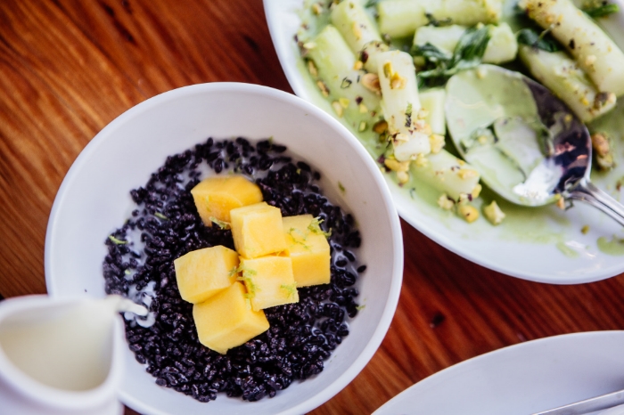 Chef Mike Whisenhunt's hot puffed rice served with sweet, warm coconut milk and fresh mango. 