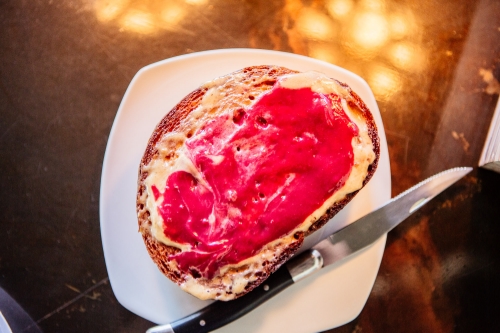 Thick cut bread, toasted to order and slathered with housemade jam and peanut butter frosting. 