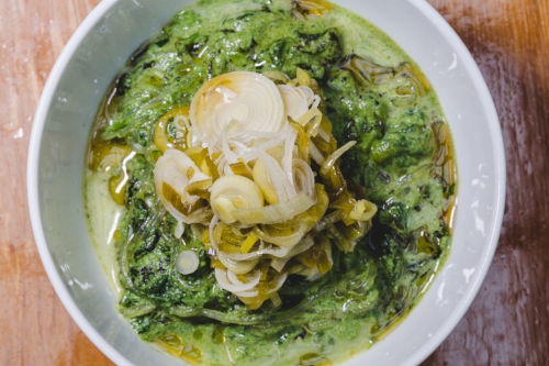 Creamed nettles with miso, glass noodles, and green garlic.&nbsp;