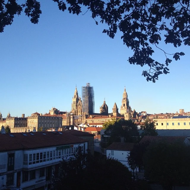 A view of the Santiago de Compostela skyline, which is dominated by numerous bell towers and ecclesiastical buildings.