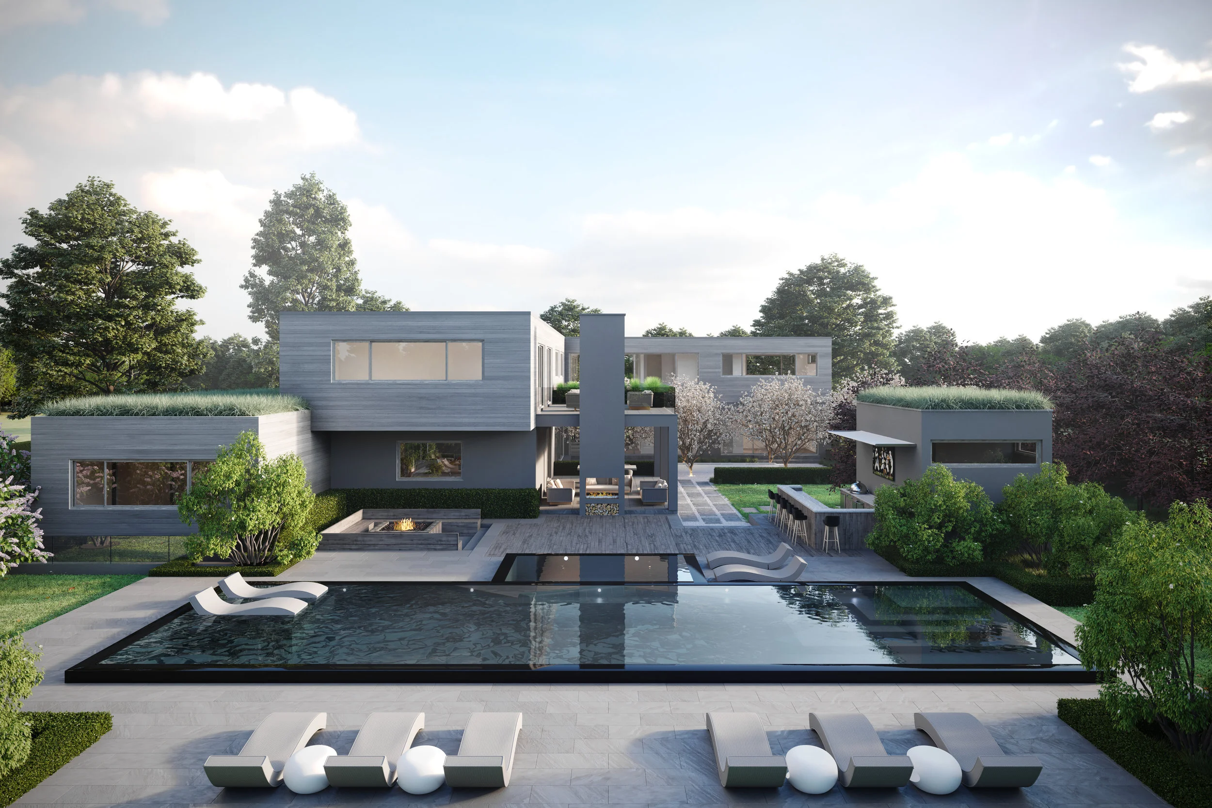 An incredible rear aerial view on this contemporary L-shaped plan residence situated in Sagaponack, NY