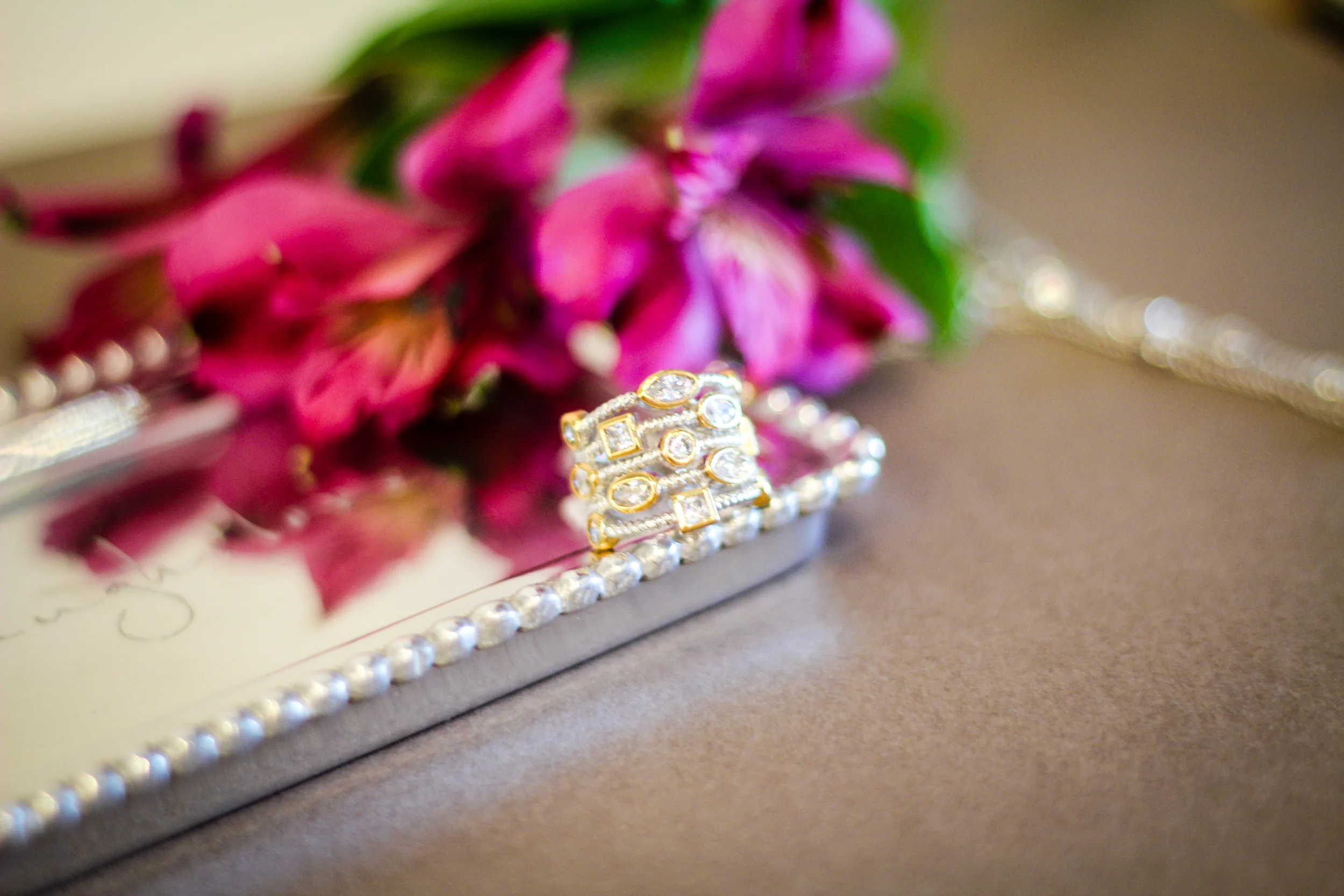Confetti ring-$35 Confetti rings come in a variety of colors and gems. They are great because they have the appearance of stacked rings in but are really just one stylish and convenient ring. 