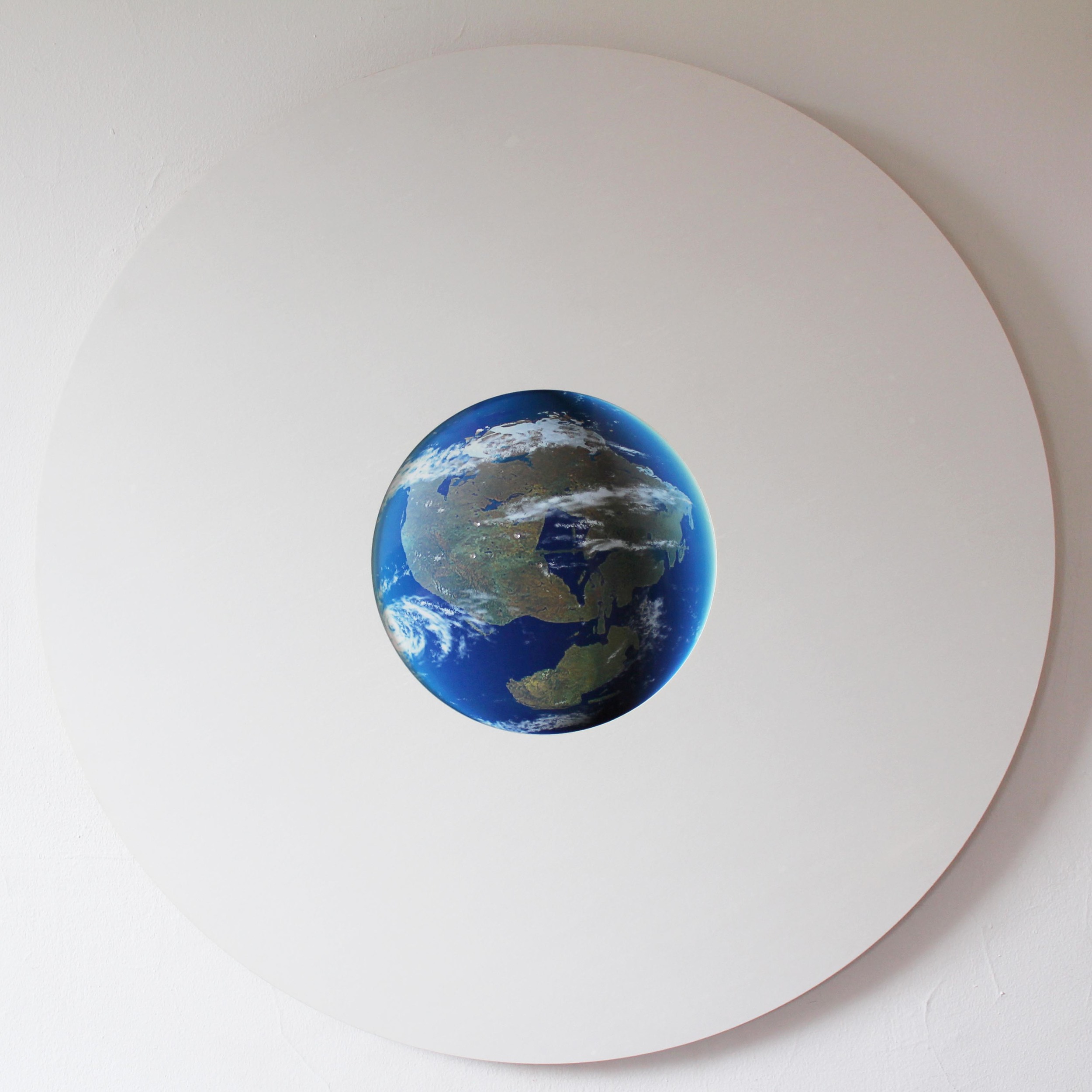 Deep Time, 2015. Lucite, print on aluminum, 33 inch diameter