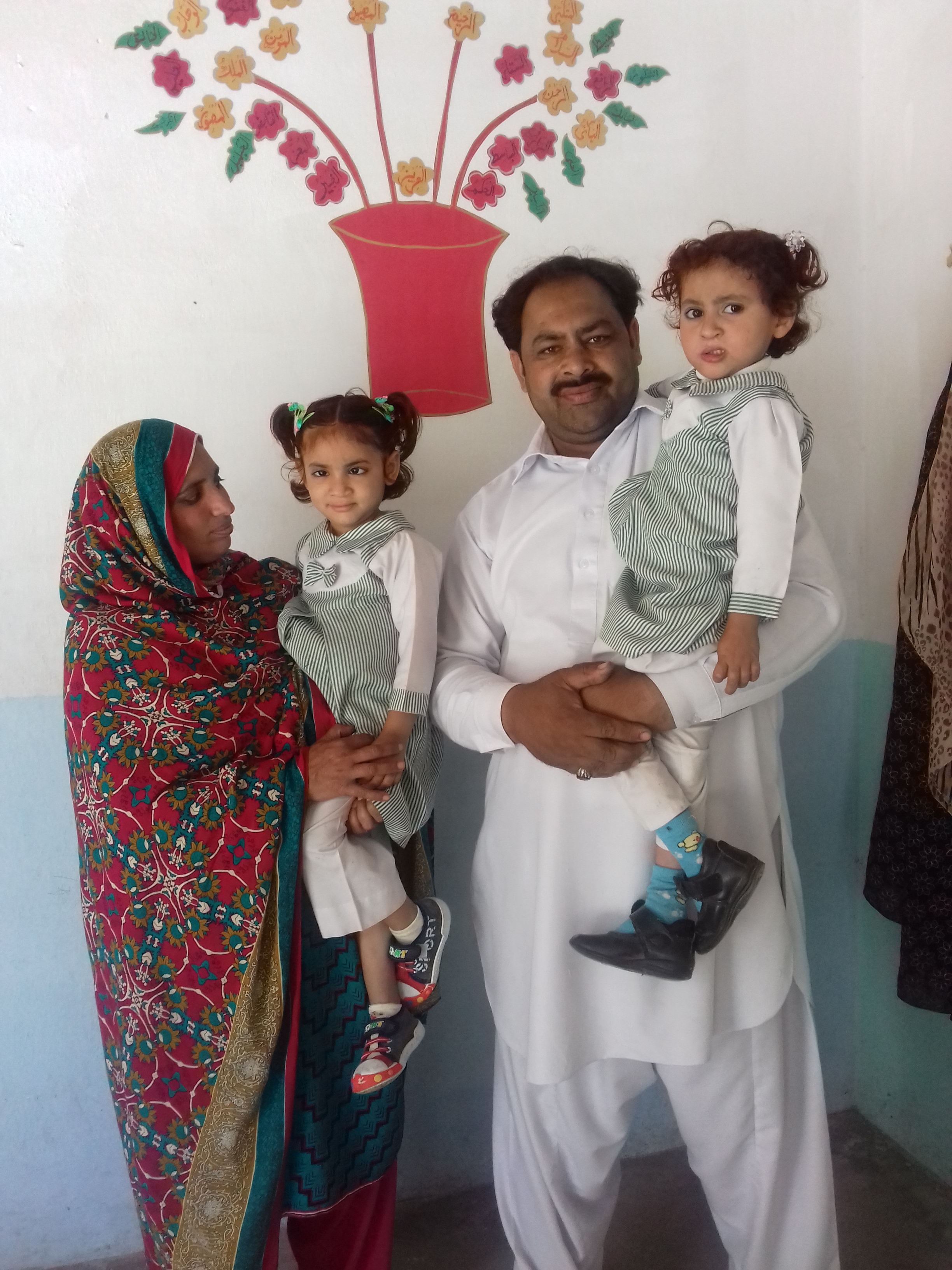 Shazana and Shahid Kouser with daughters Muntaha, left, and Mursleen, left