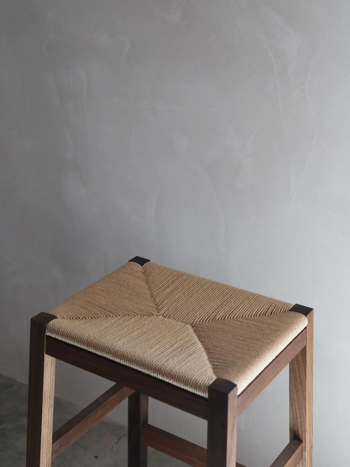 Currently available in our ready to ship shop. Simple stool in oiled walnut and natural Danish Cord. 26H. Showroom model  in like new condition, 30% off of MSRP. Follow link in bio for more info!