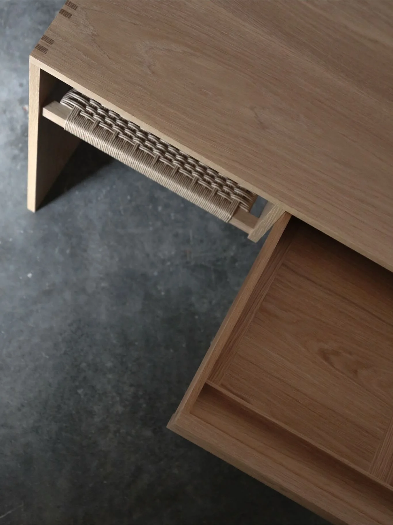 Custom version of our Woven Bench, the Woven Desk. Hand cut half blind dovetails and hand woven shelf. Thank you to our clients, who keep work interesting with custom requests like this one!