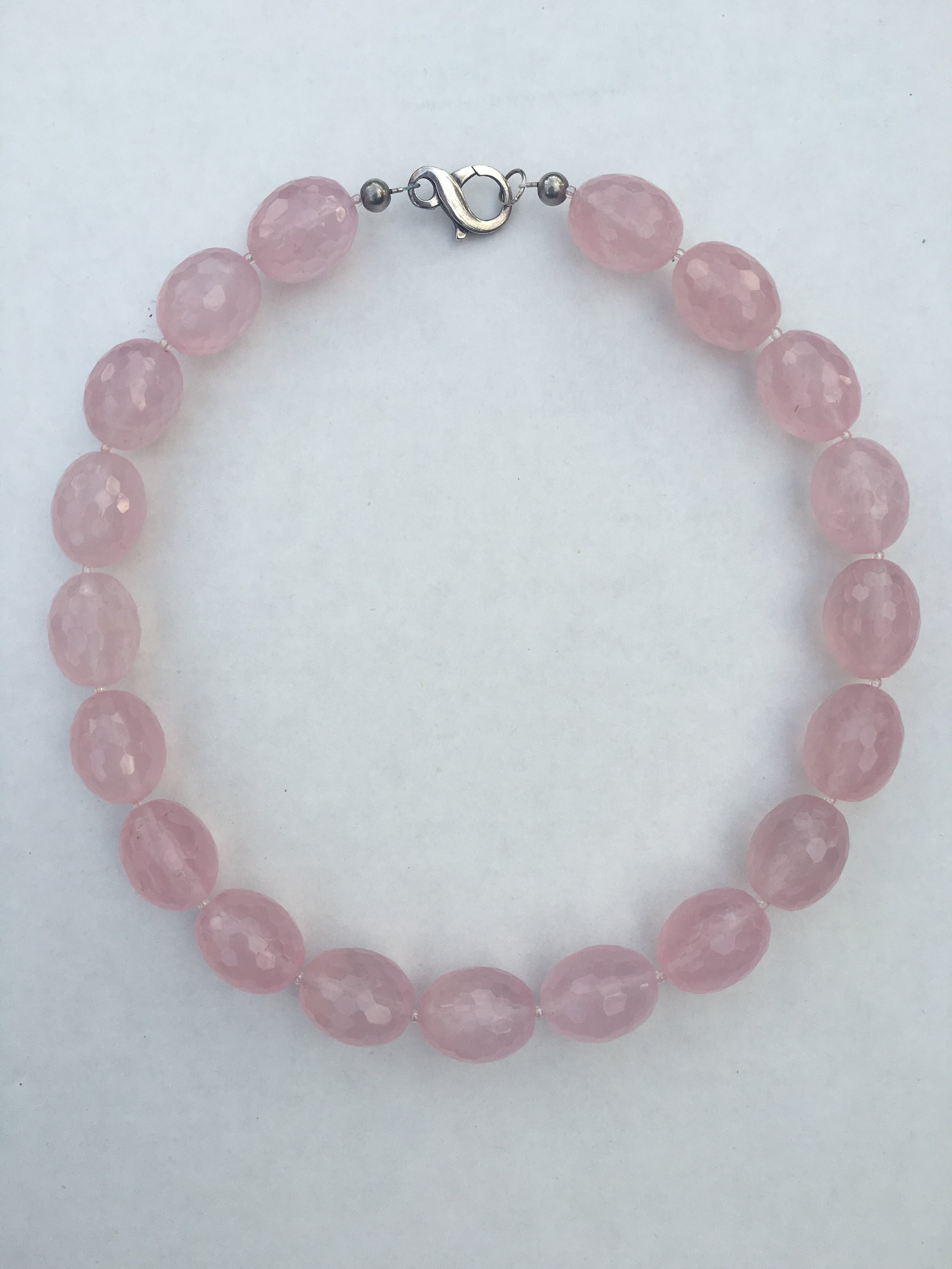 rose QUARTZ NECKLACE Faceted oval rose quartz beaded necklace. Stainless steel clasp. 