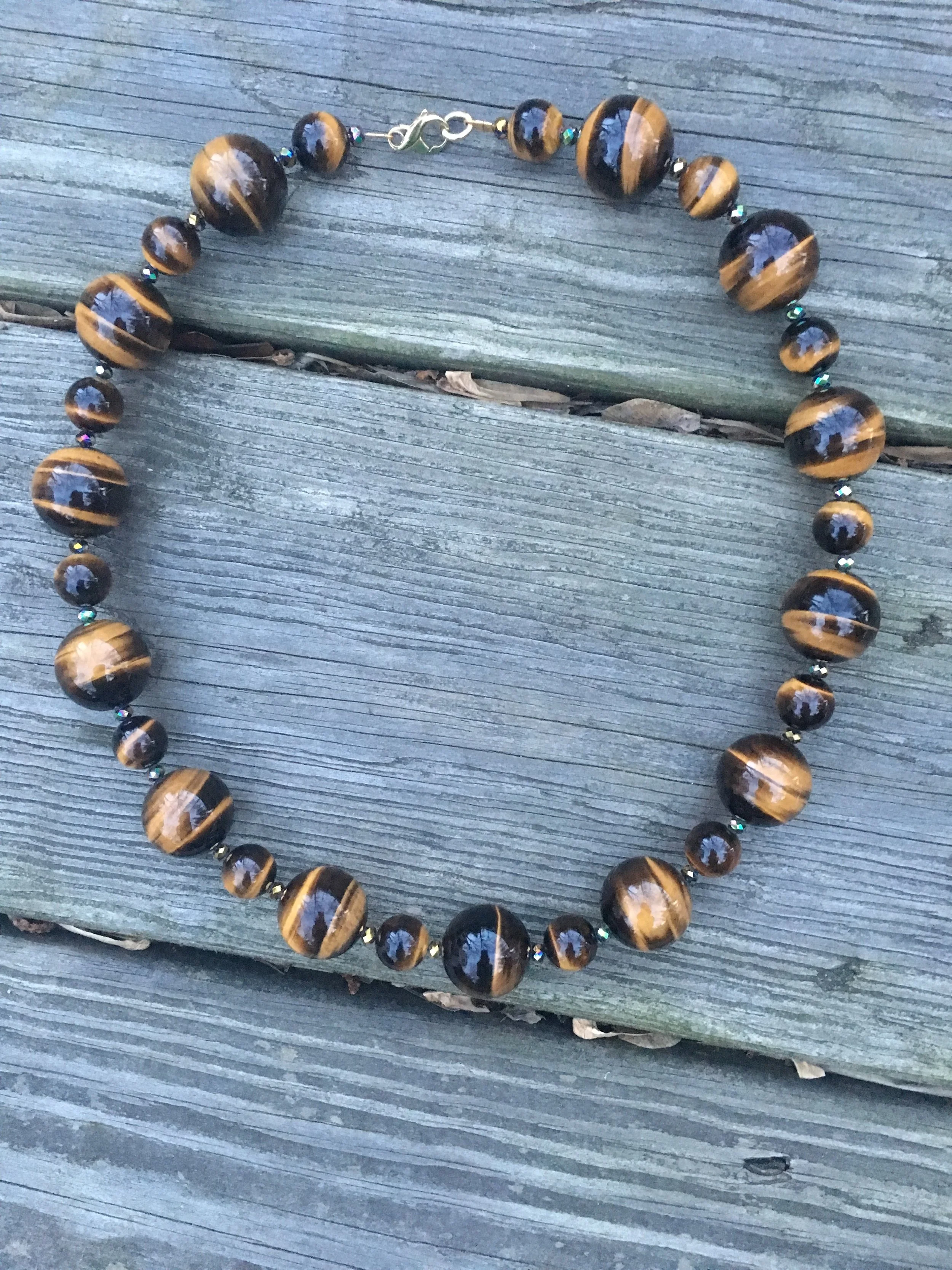 tigers eye NECKLACE Tigers eye necklace with glass beads and gold filled clasp.