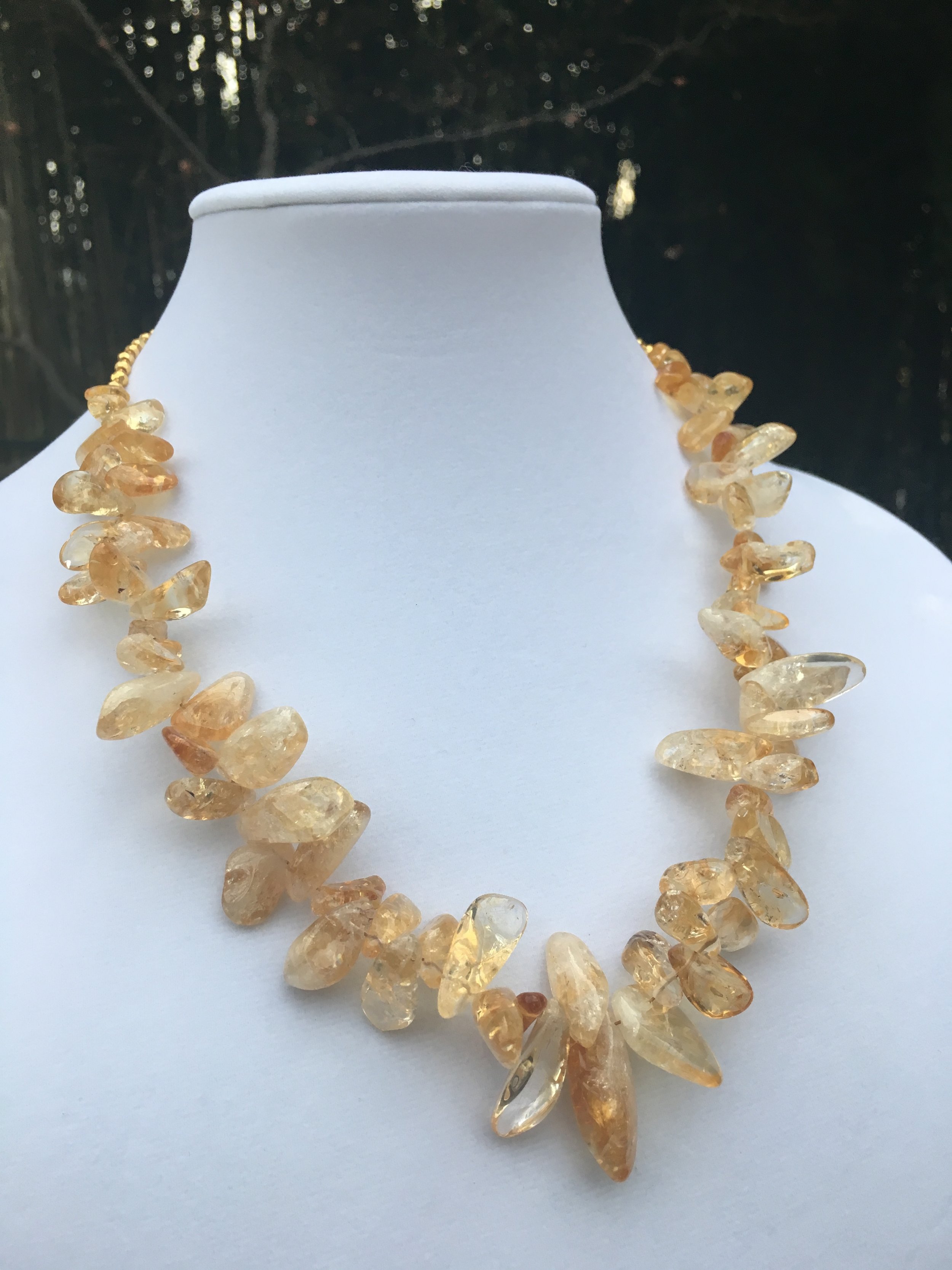 CITRINE NECKLACE Citrine nugget necklace with titanium-coated hematite beads and 18k gold plated clasp. $300 