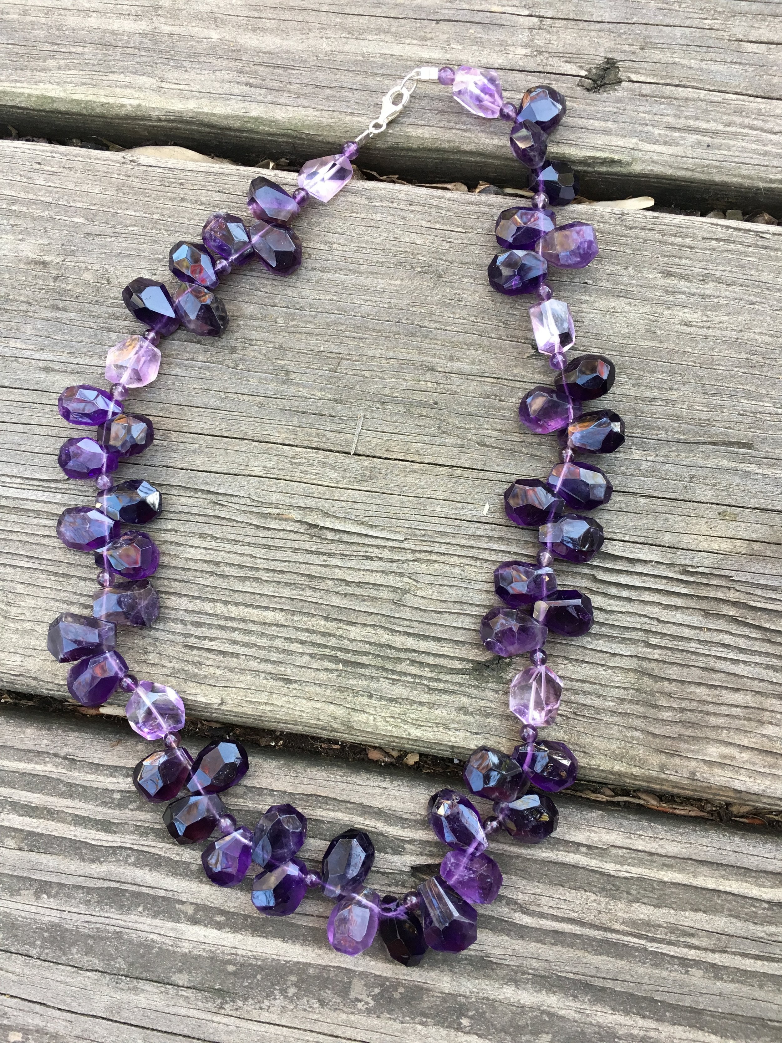 amethyst teardrop NECKLACE (SOLD) Faceted amethyst teardrop beads with faceted light amethyst beads. Sterling silver clasp. $400 