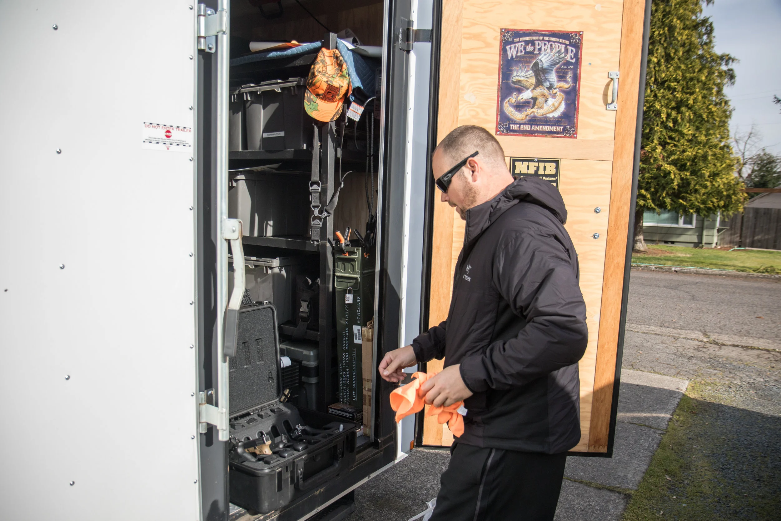 With courses and events across Lane County, LeBlanc keeps all of the firearms and gear he may need carefully packed inside a small white trailer he likes to call his mobile office. (Aaron Nelson)