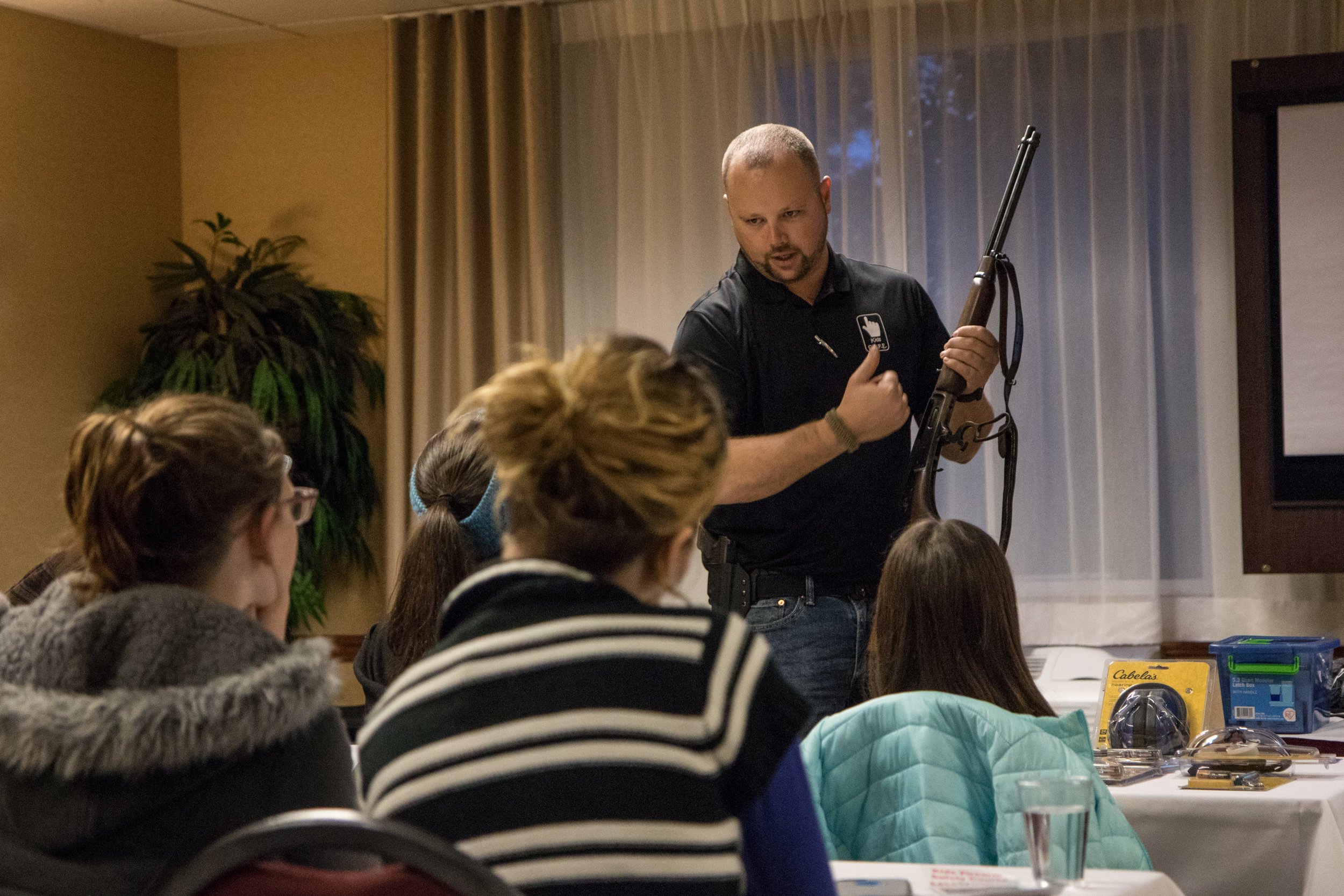  NRA certified firearms instructor Derek LeBlanc discusses proper handling of a lever-action rifle at a Kids S.A.F.E. gun safety course in Springfield, Ore., on Jan. 22, 2017. "I want everyone to be armed, but I also don't want any family to experien