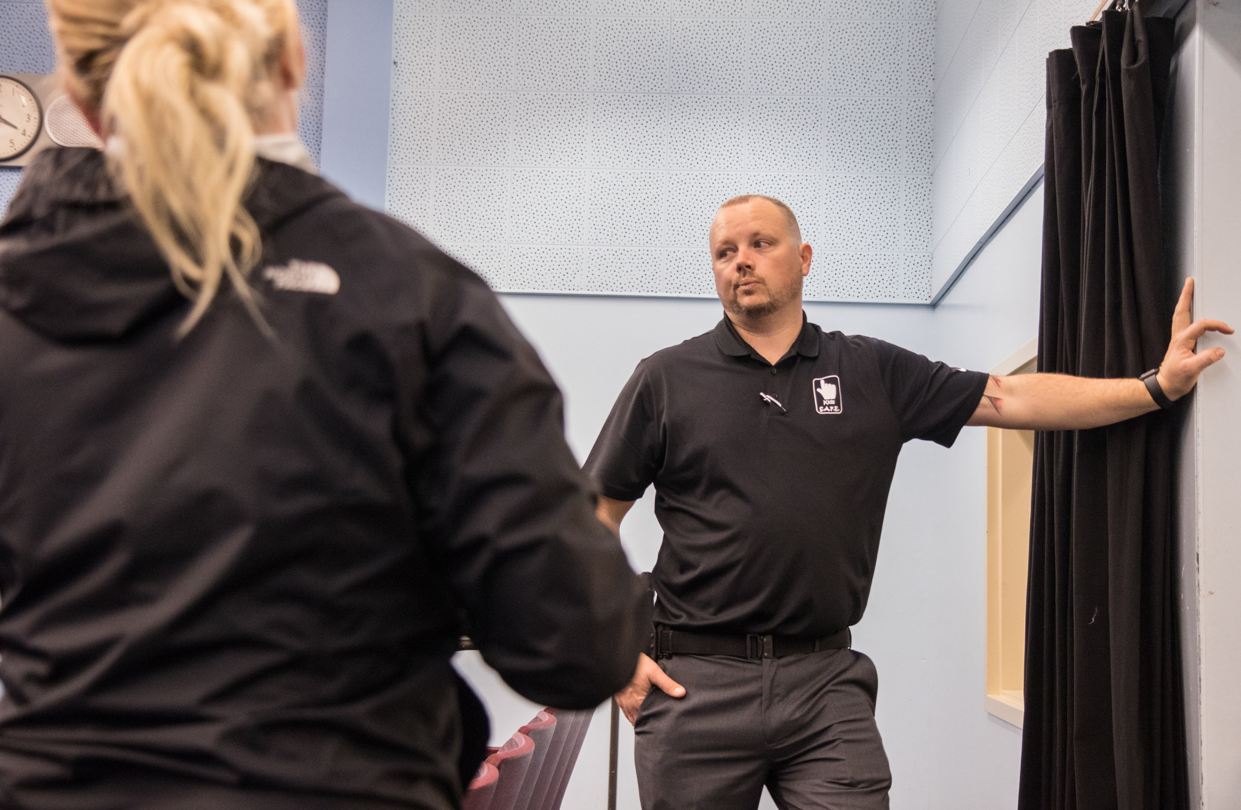 Derek LeBlanc listens to advice from his volunteer staff and girlfriend Jen Ebert after completing his first Kids S.A.F.E. presentation inside a public school on Feb. 3, 2017, in the Elmira High School Auditorium. "Gun education in every school is the goal," said LeBlanc.