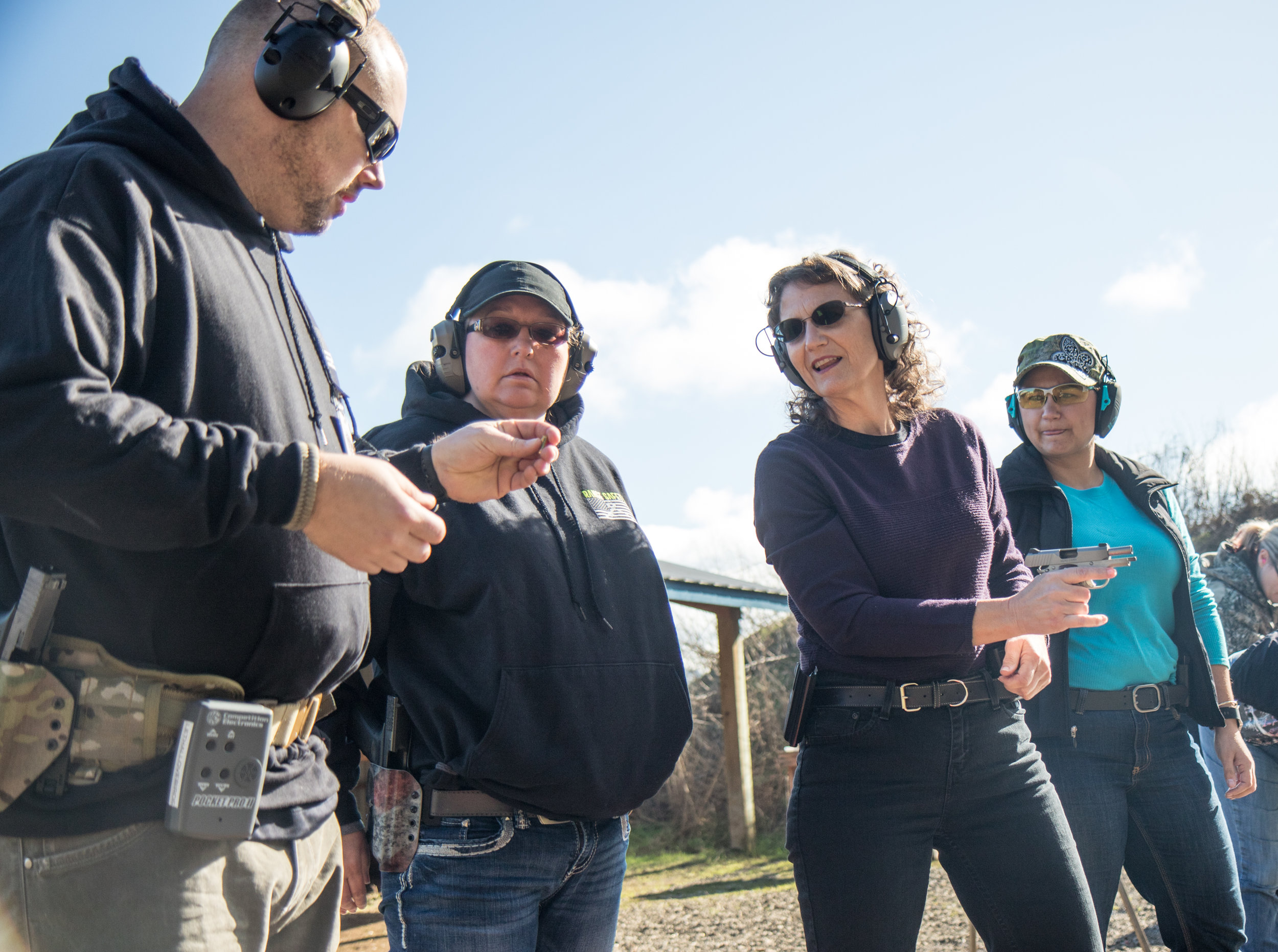  Karen Wussting speaks with Derek LeBlanc about techniques for dealing with a misfiring gun during a women's self defense course at the Albany Pistol &amp; Rifle Club in Albany, Ore., on Feb. 11, 2017. "My goal is to get as many of these women as pos