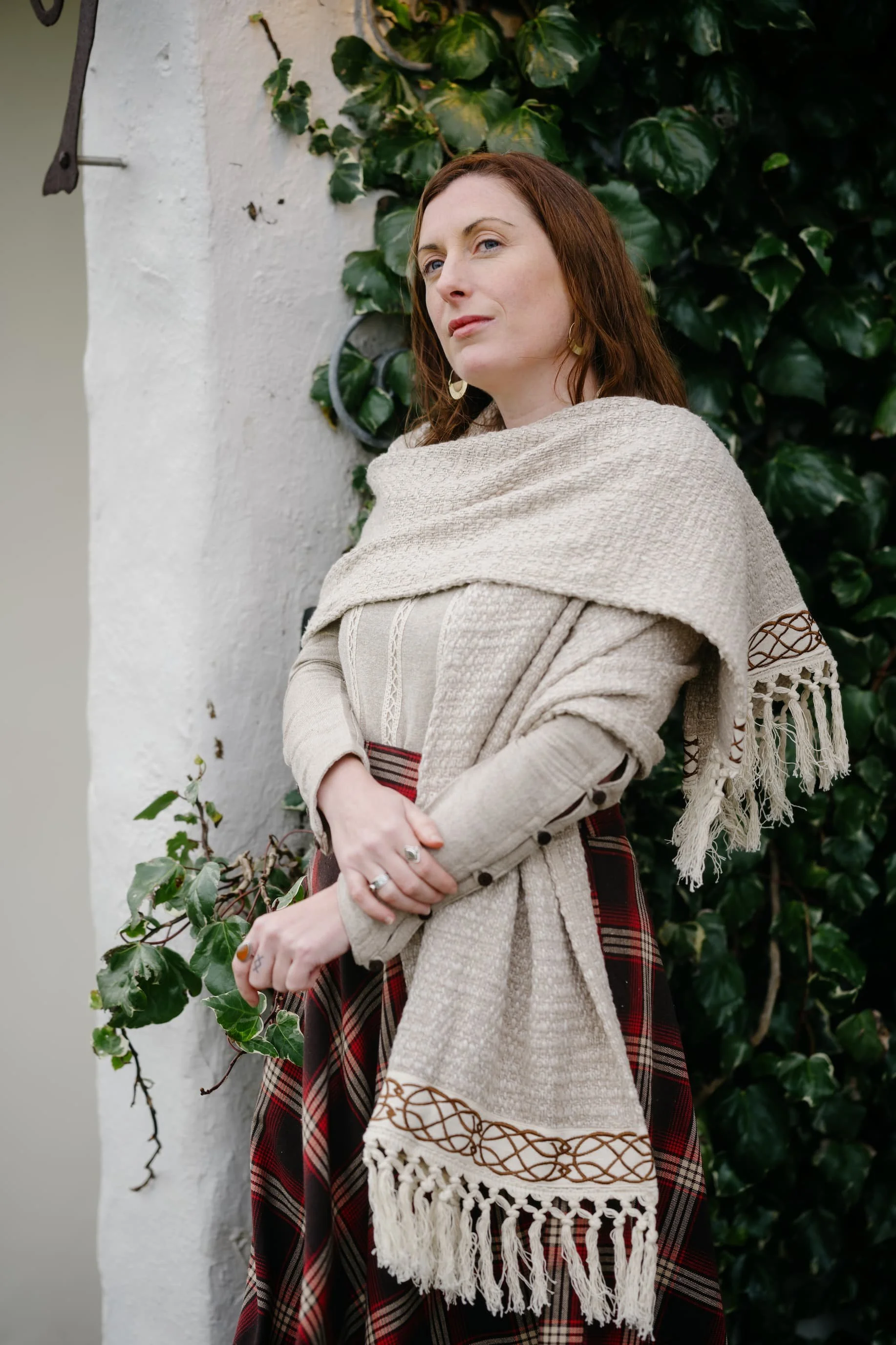 Discover our Celtic Embroidered woven cotton shawl by Celtic Fusion, an Irish designer embroidered shawl with a Celtic knot design, perfect as a festival shawl or wedding shawl. (Copy)