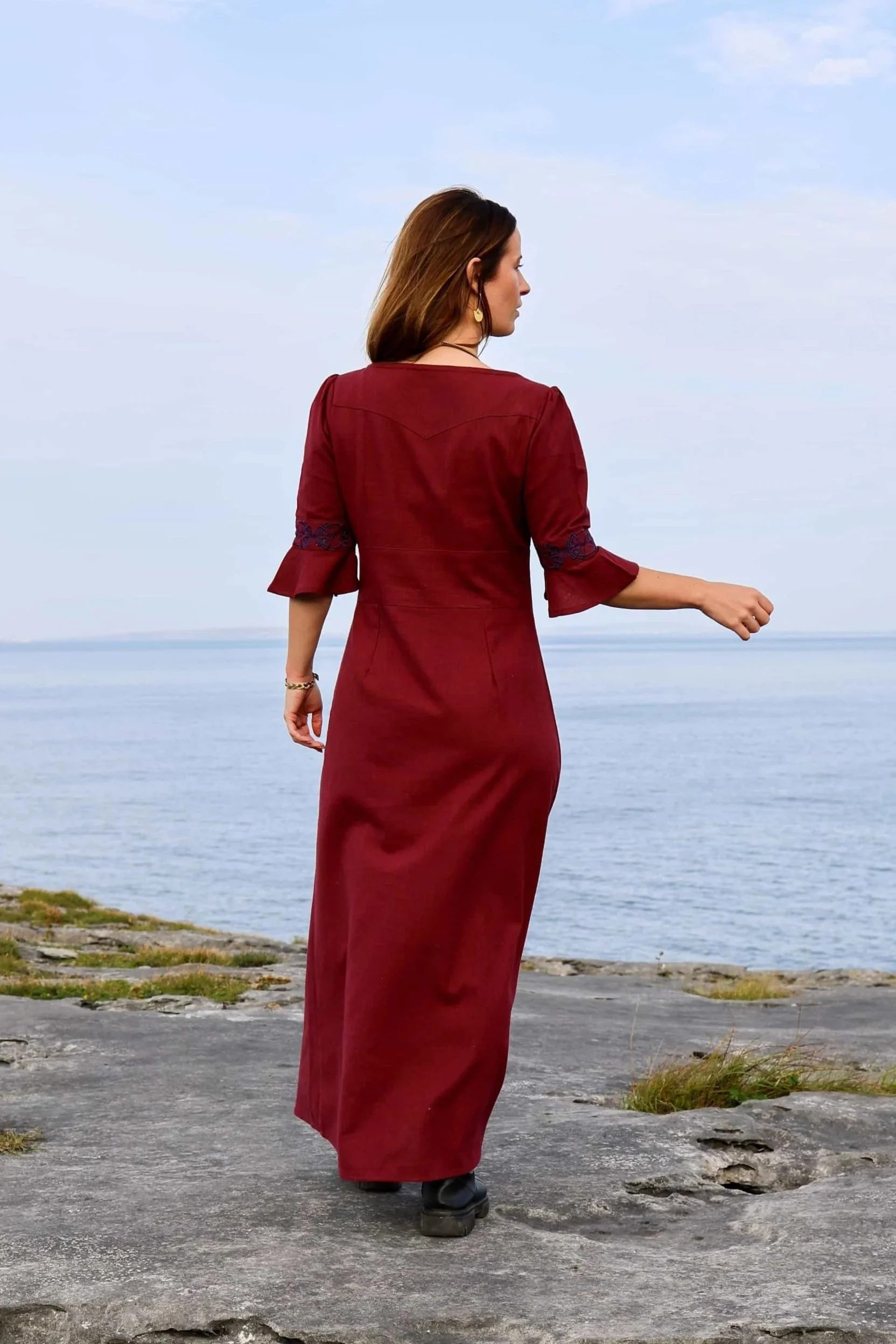 Romantic Celtic dress in deep berry red with Celtic knot embroidery and button-down design. Breathable cotton folklore dress inspired by the Hawthorn tree.