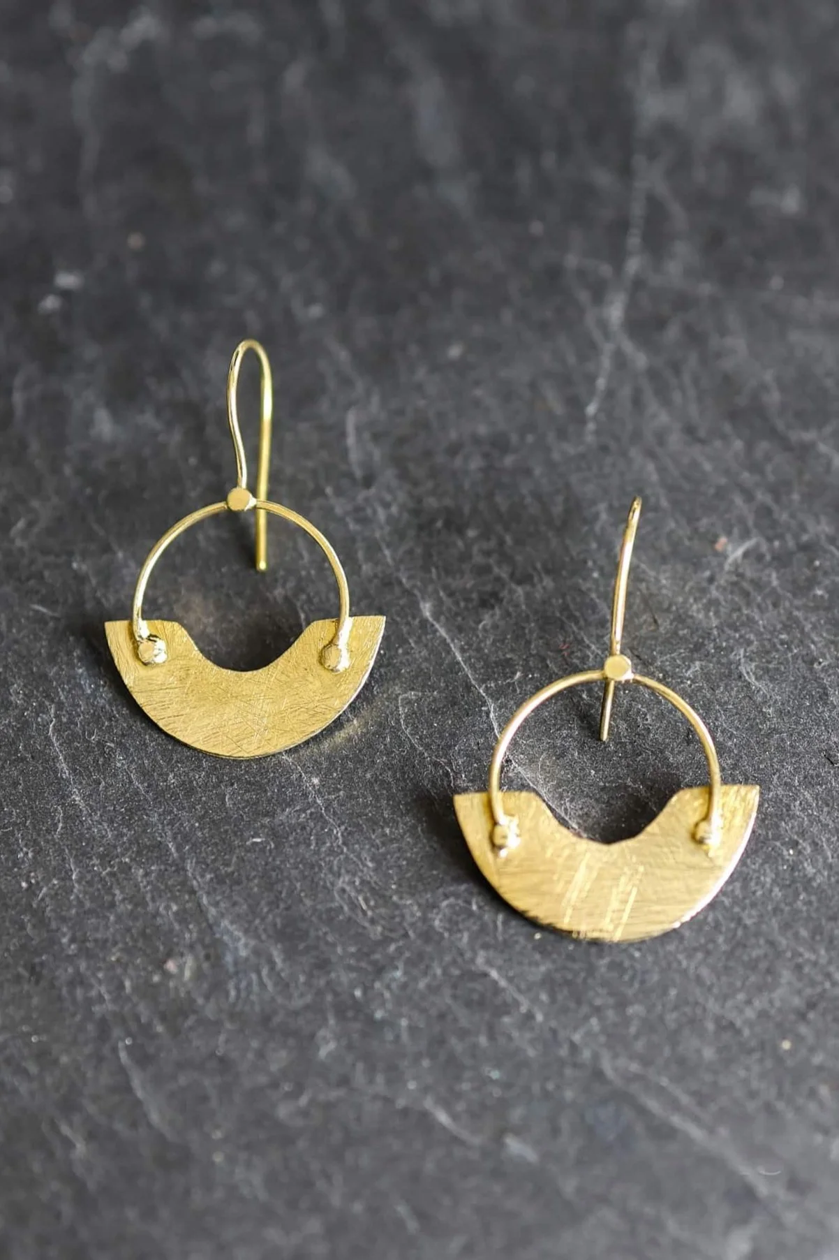 Handcrafted Brass Earrings with a minimalist crescent design, these Celtic hoop earrings are a modern take on traditional Irish jewellery.