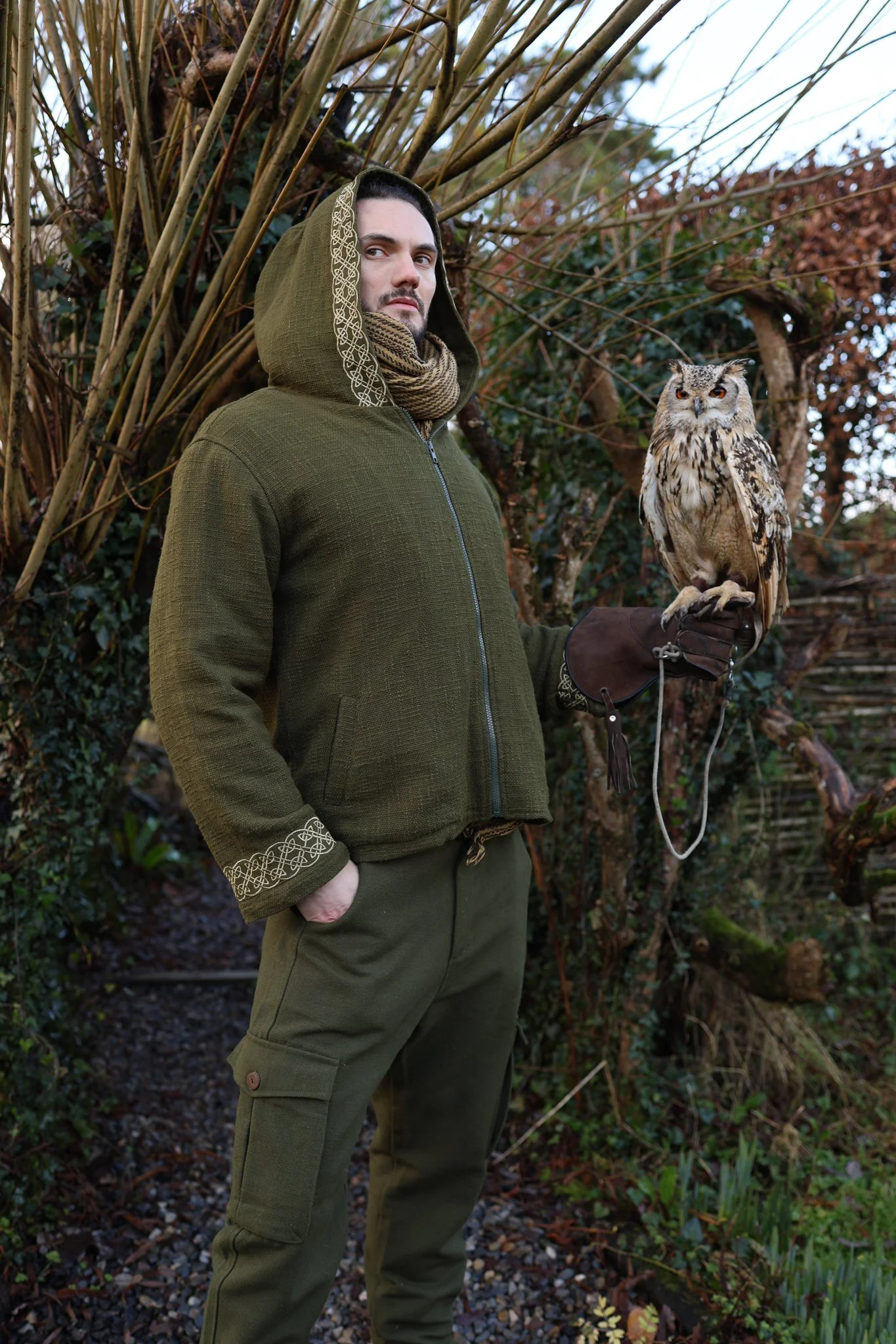Moss green Cernunnos Celtic Jacket  fleece lined with celtic knotwork embroidery. Hooded green jacket made in handwoven cotton with soft fleece lining for warmth.