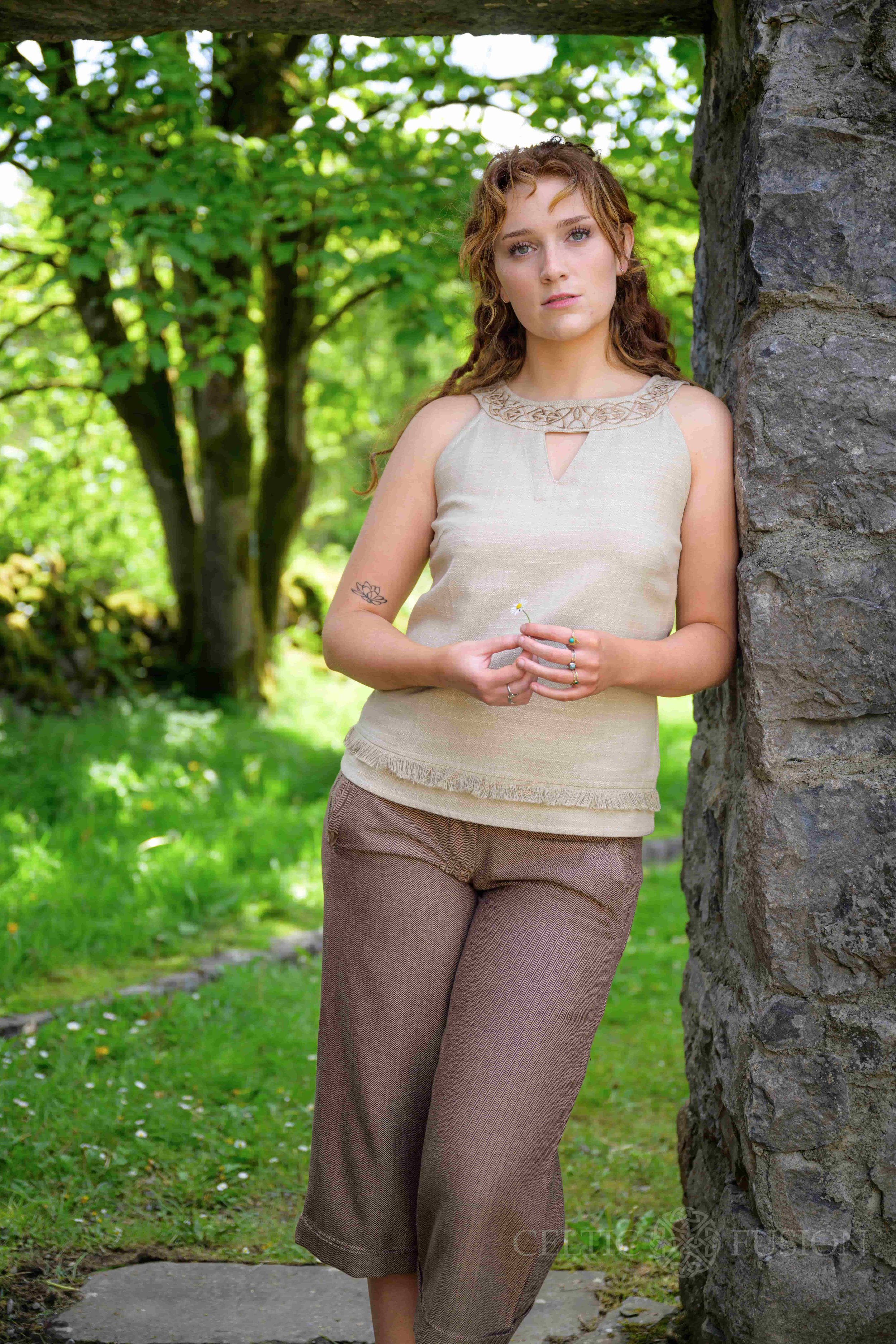 Discover our Celtic top, a boho embroidered top that embodies Celtic clothing elegance. Crafted from premium cotton, this piece features intricate Celtic embroidery, ideal for Irish design lovers.
