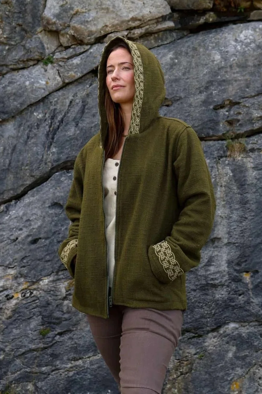 A woman wears the moss green Hooded Jacket with Fleece Lining and Embroidered Celtic Knotwork