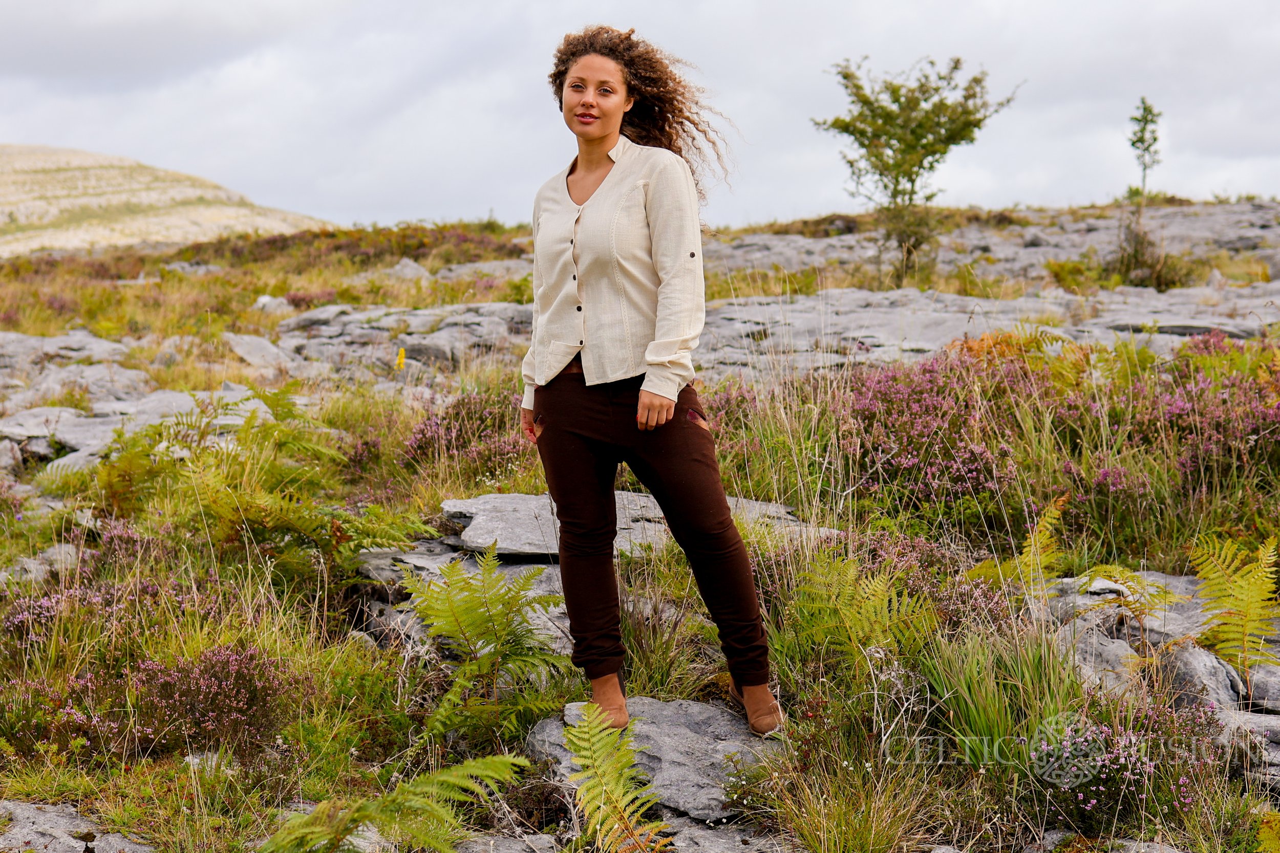 Upgrade your wardrobe with our brown low rise trousers, perfect as womens casual trousers. These low crotch trousers feature tweed accents, a tapered leg, and an elastic waistband for comfort.