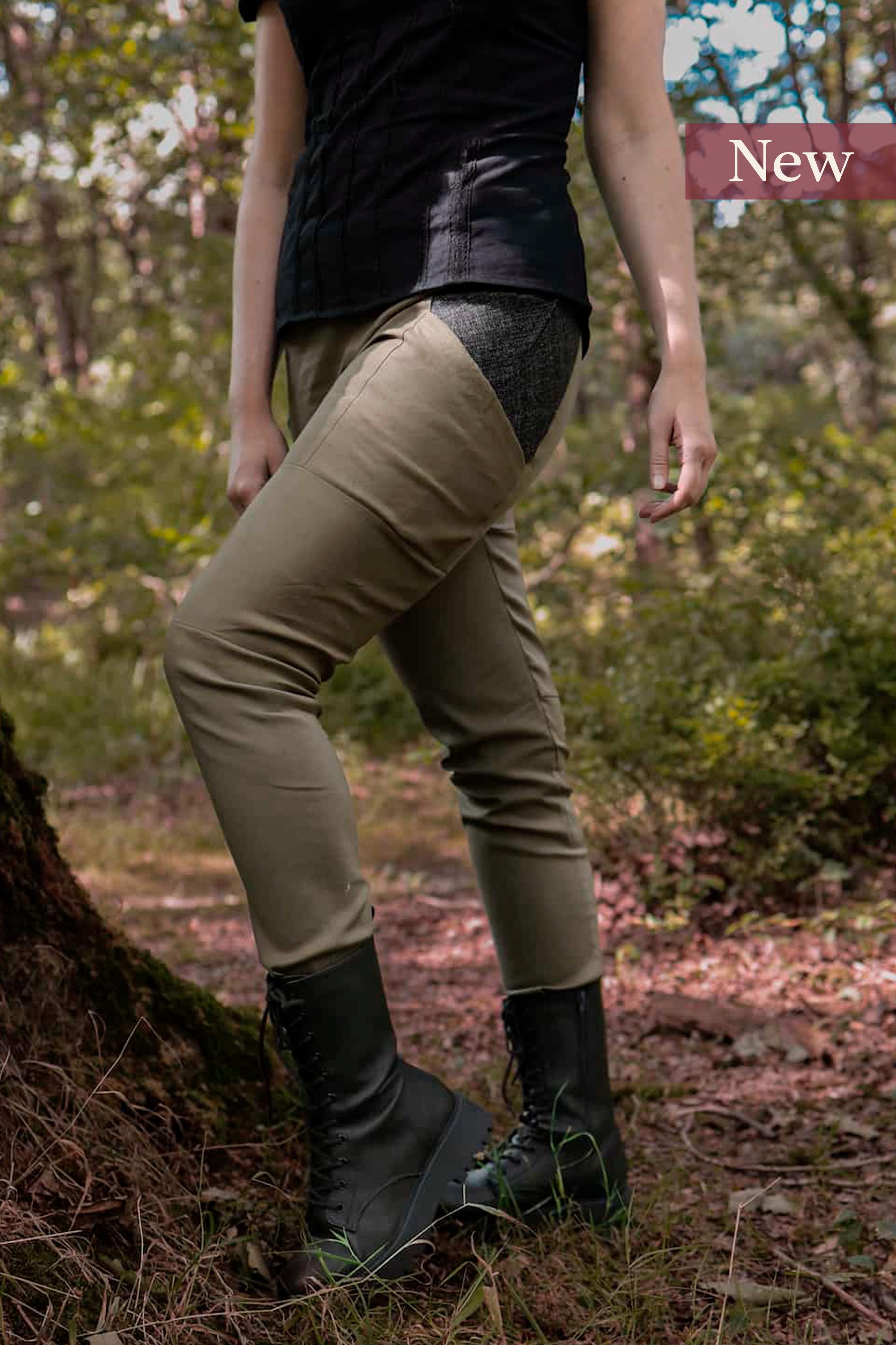 A model wears the Tara Linen Leggings, sustainable clothing linen blend trousers with tweed wool plaid pockets designed by Celtic Fusion.