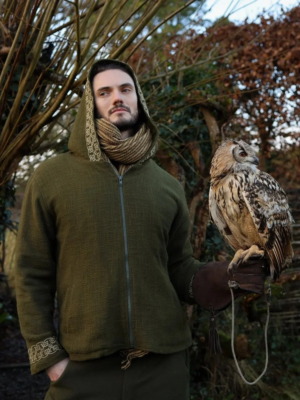 Moss green Cernunnos Celtic Jacket  fleece lined with celtic knotwork embroidery. Hooded green jacket made in handwoven cotton with soft fleece lining for warmth.