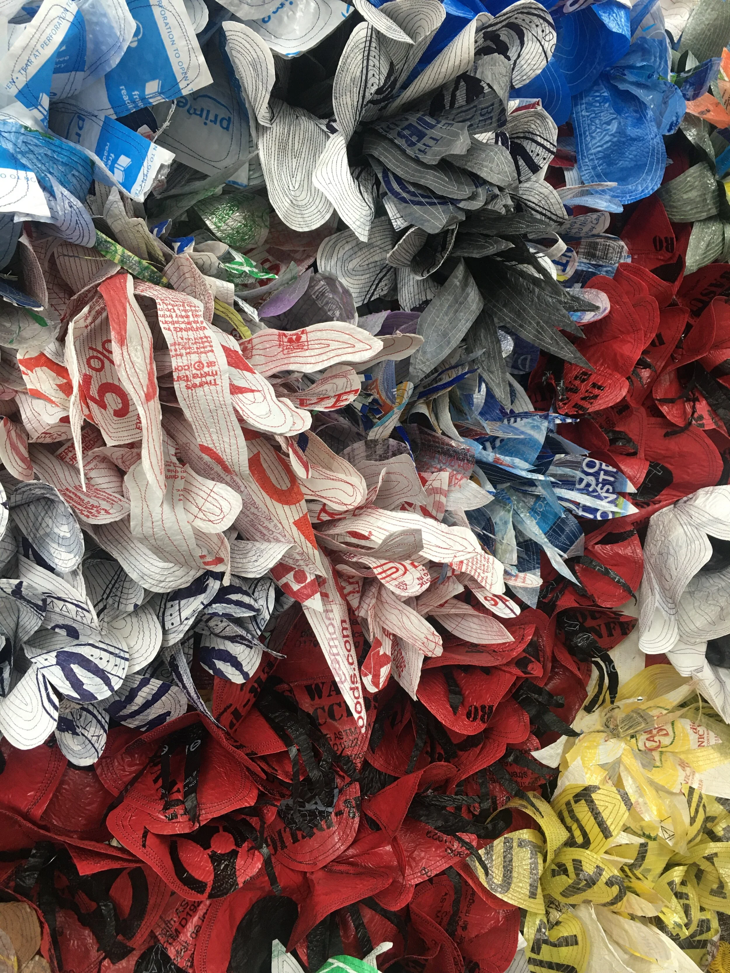  The average American family takes home almost 1,500 plastic shopping bags a year. Only 1 percent of the plastic bags are returned for recycling. The rest end up in landfills or as litter. Up to 80 percent of the ocean plastic pollution enters the oc