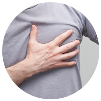 Man touching heart. Jala Flow Yoga in Sidmouth is good for the heart and lungs, lower blood pressure and cholesterol. 