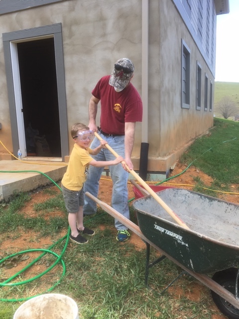 Asher mixing concrete.JPG