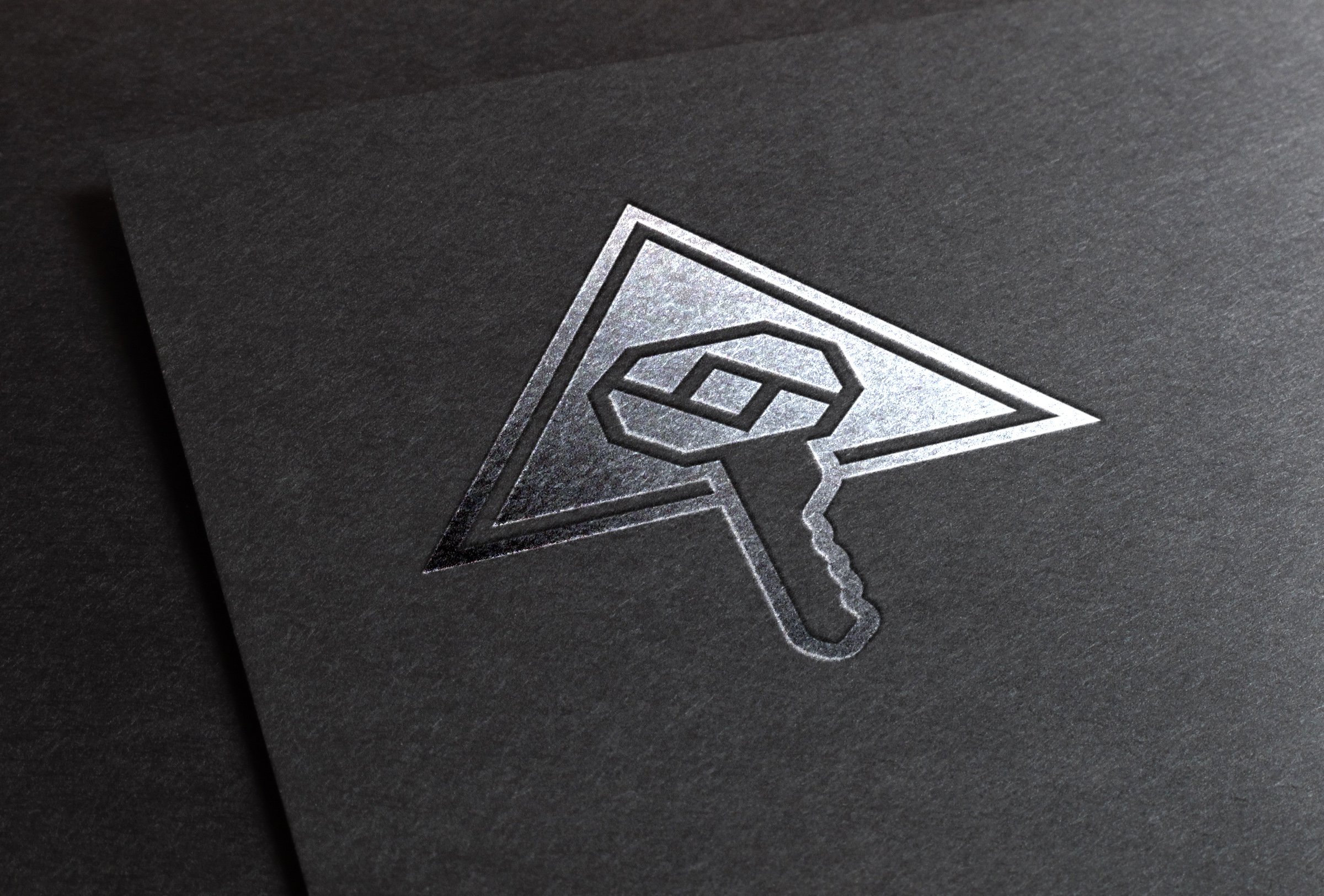 303 Property logo silver foil mockup.jpg