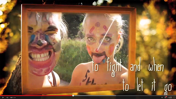 Emilia and her best friend made it into Court Yard Hounds ' The World Smiles ' video with this photo they submitted. These two will also be seeing the upcoming DCX MMXVI show in Oslo together