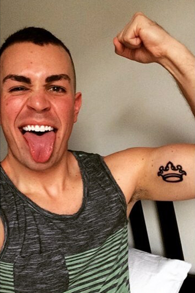 Ryan's tattoo of the DCX Crown symbol