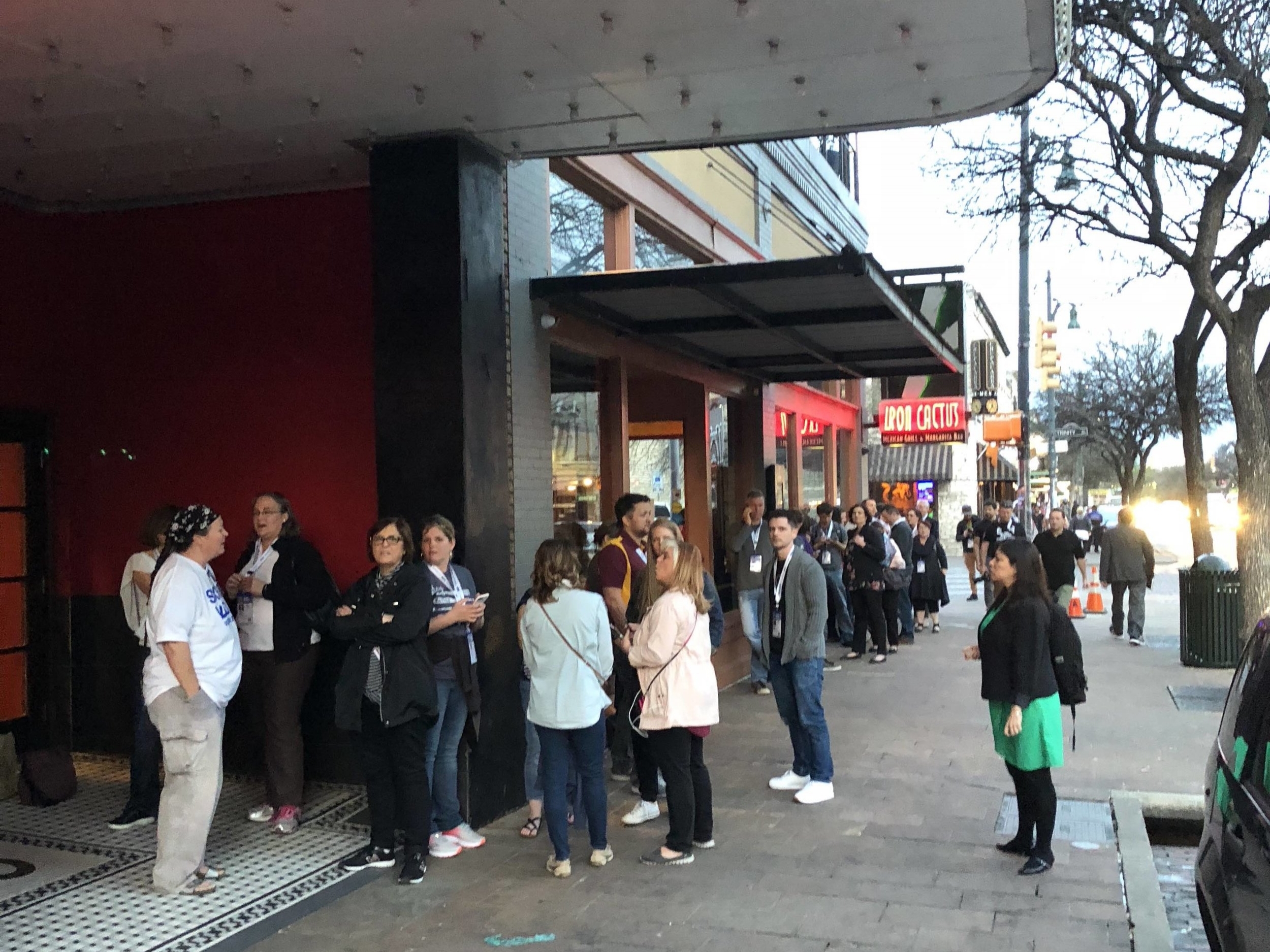 30 minutes before the screening, a line of people forms outside the theater. 