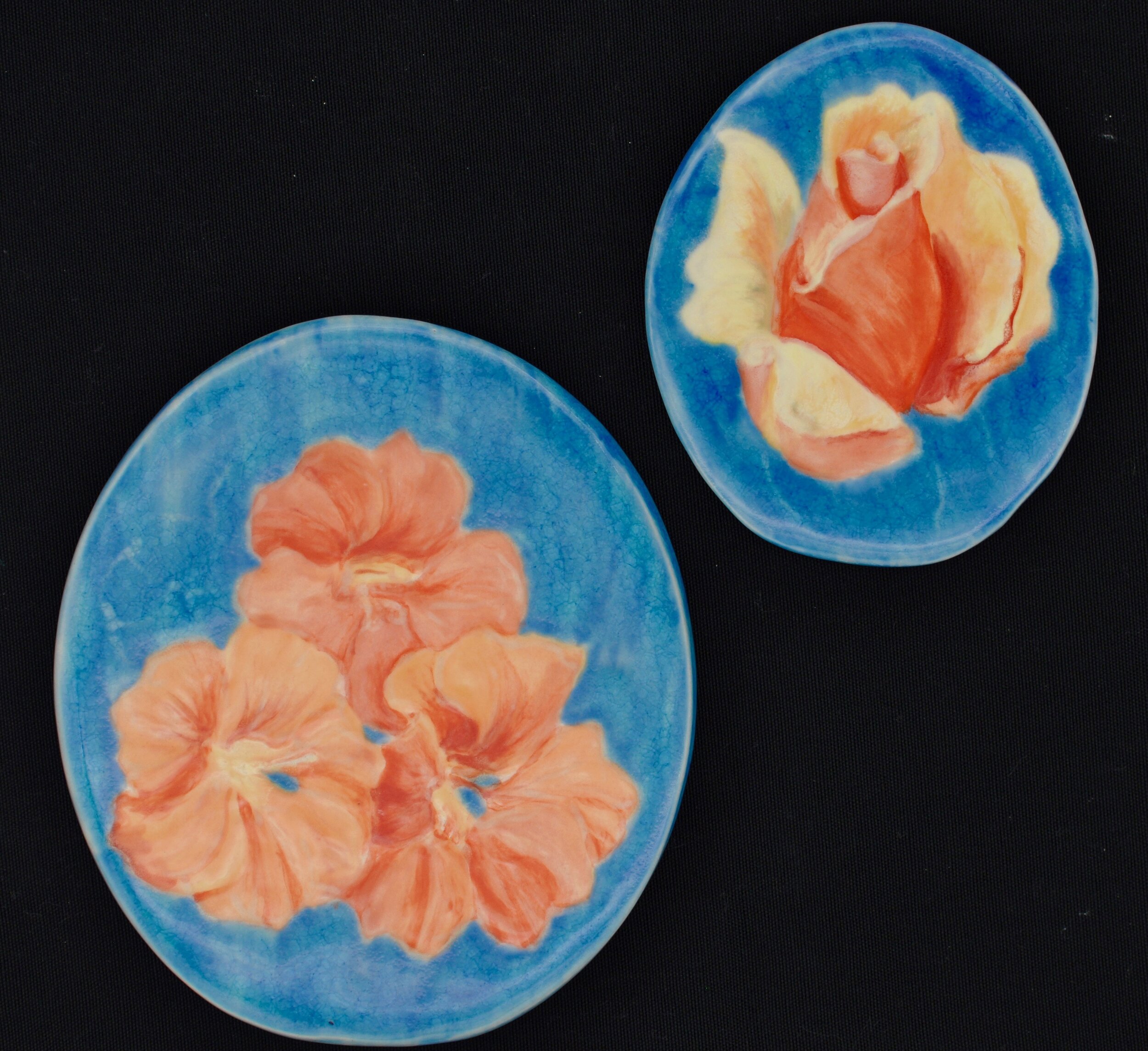  Left to right:  1) Nasturtiums - 6.25” tall oval tile ($50)  2) Single Rosebud - 4.5” tall oval tile ($25) 