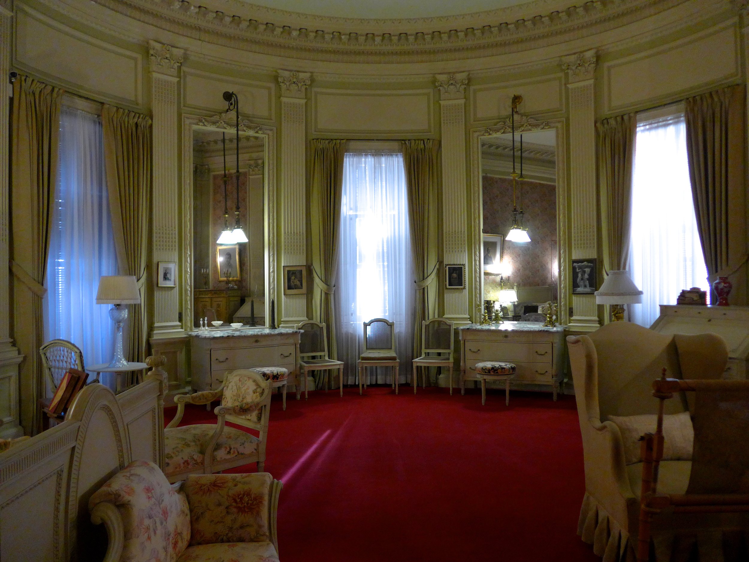 Bedroom on the other side of the windows from the previous picture. Not bad, for wall to wall carpeting.