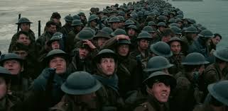There's something jarring about seeing so many British soldiers packed so tightly together as they await evacuation. The vulnerability of Britain was left out in the open for all to see in Dunkirk .
