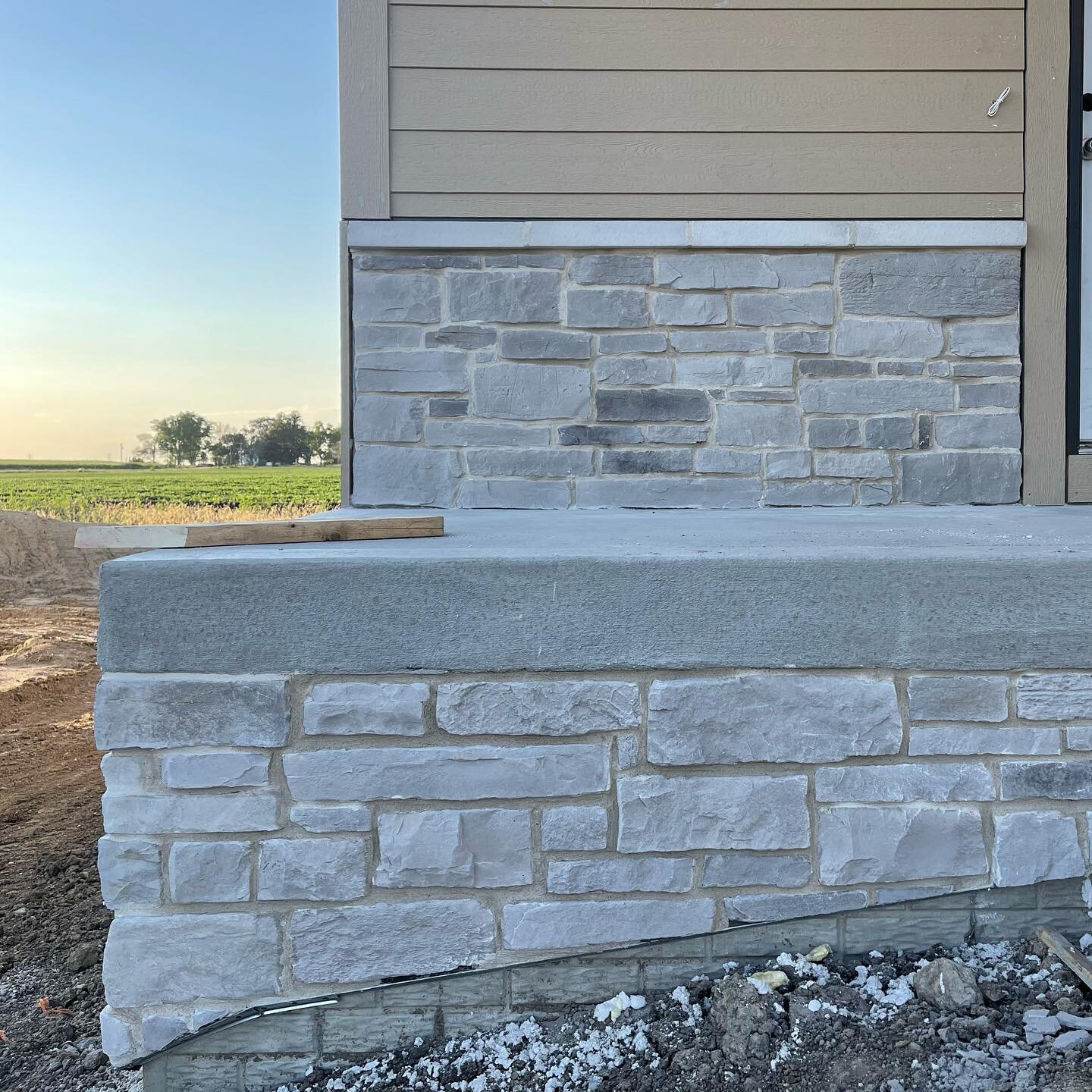 The stone and grout are complete at our #cooperbuild (our 2-story Cooper Plan) and our #clairebuild (our ranch style Claire Plan). 
.
Our pick for the stone on both builds is an instant classic, Winter Ledge Point stone by @dutchqualitystone with whi