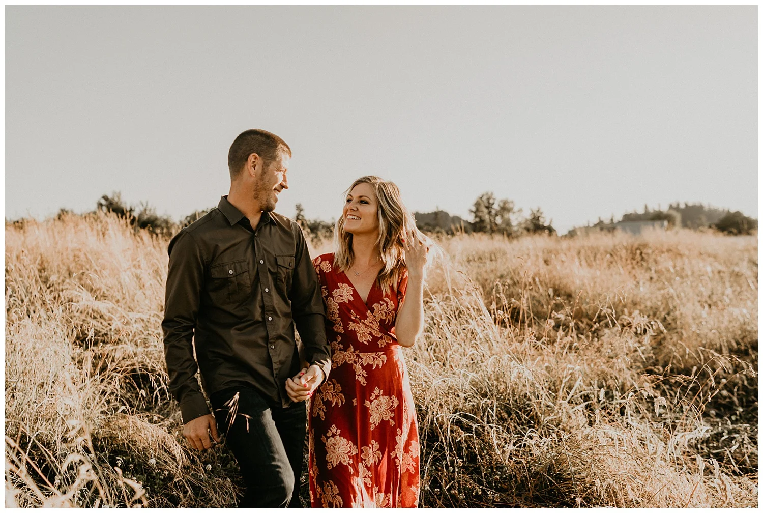 golden hour tall grass engagement session