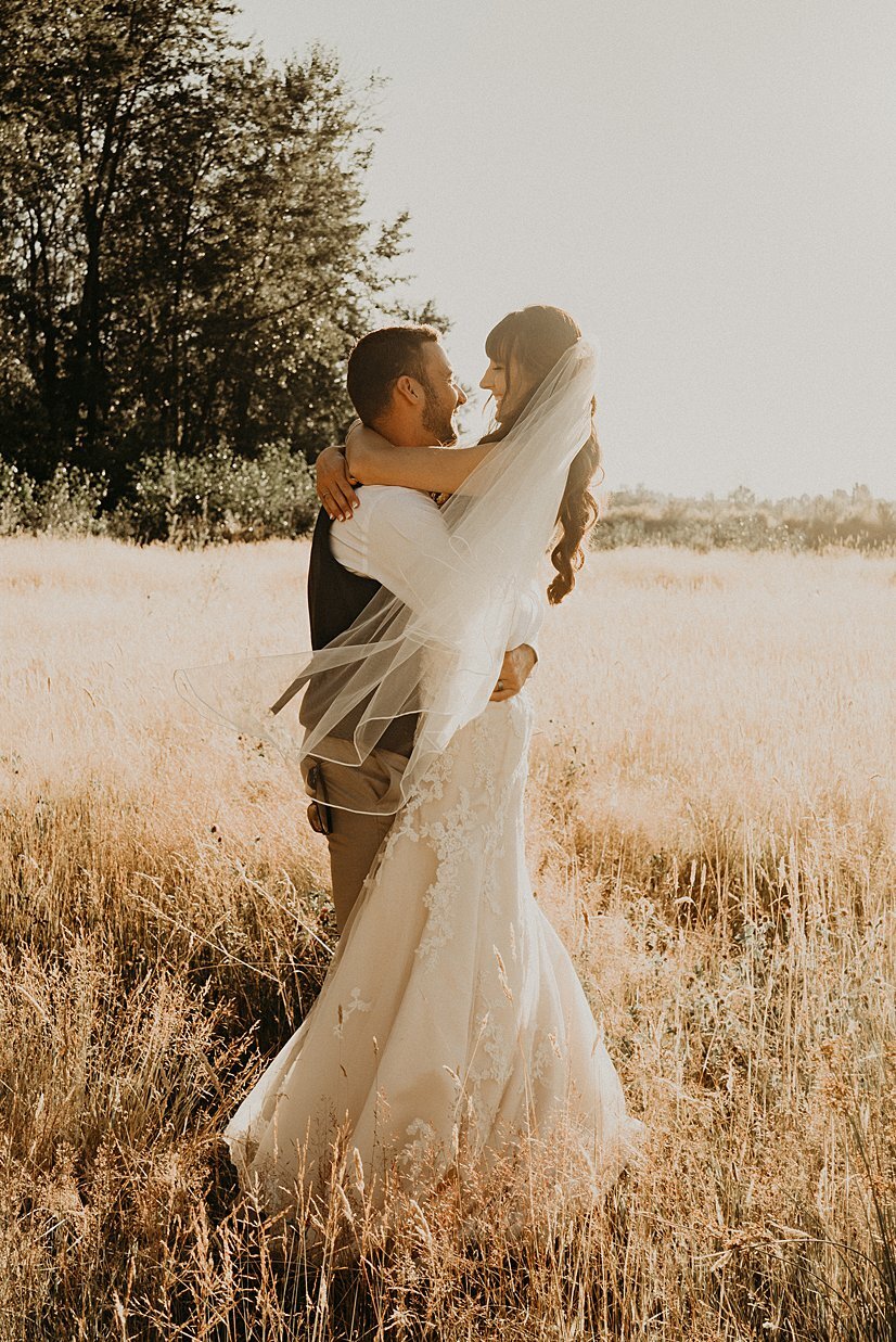  golden field bride and groom portraits with fingertip length veil 