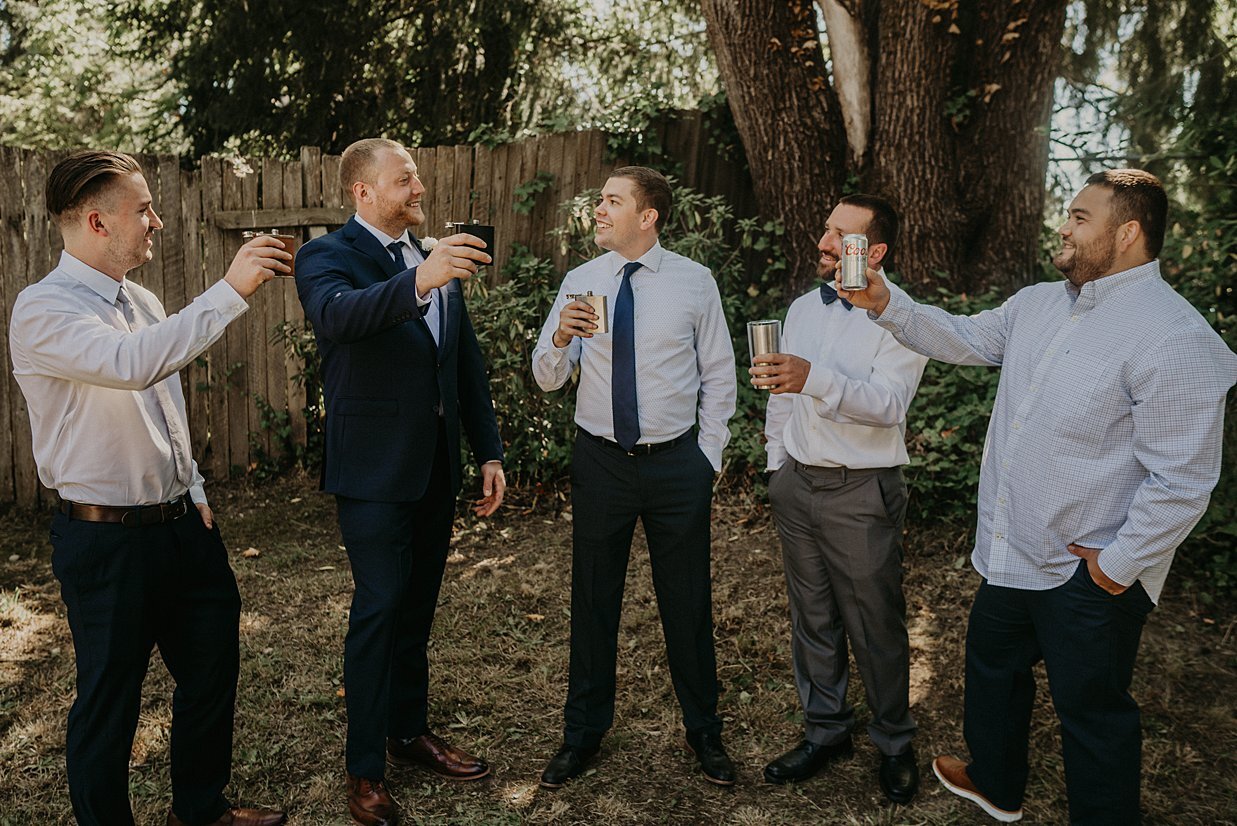  groomsmen cheers beers pre-wedding in Federal Way 
