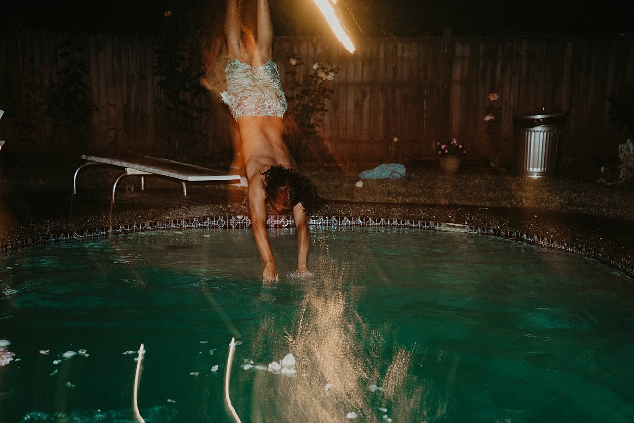  bride’s brother jumping into pool at reception 